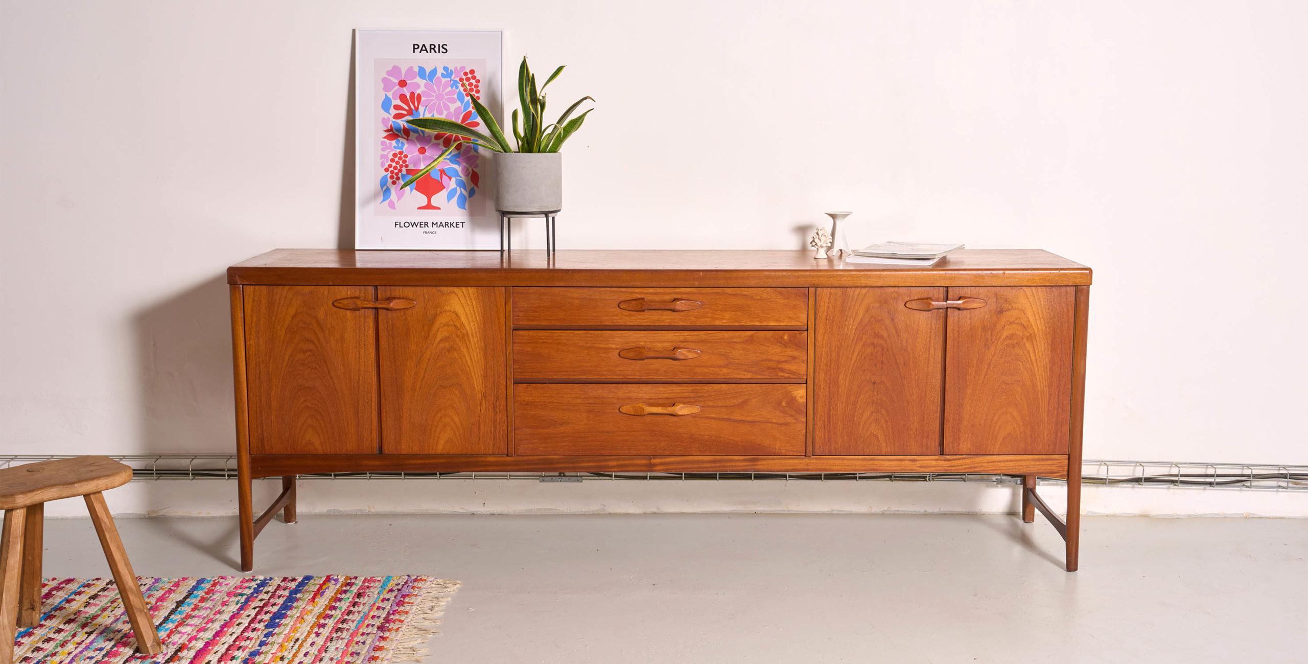 Large vintage enfilade from the English brand Nathan dating from the 1960's -70's.

Product description
Scandinavian style vintage Nathan sideboard in teak from the 1960-70s.
This vintage sideboard can be placed in the bedroom or the living room to