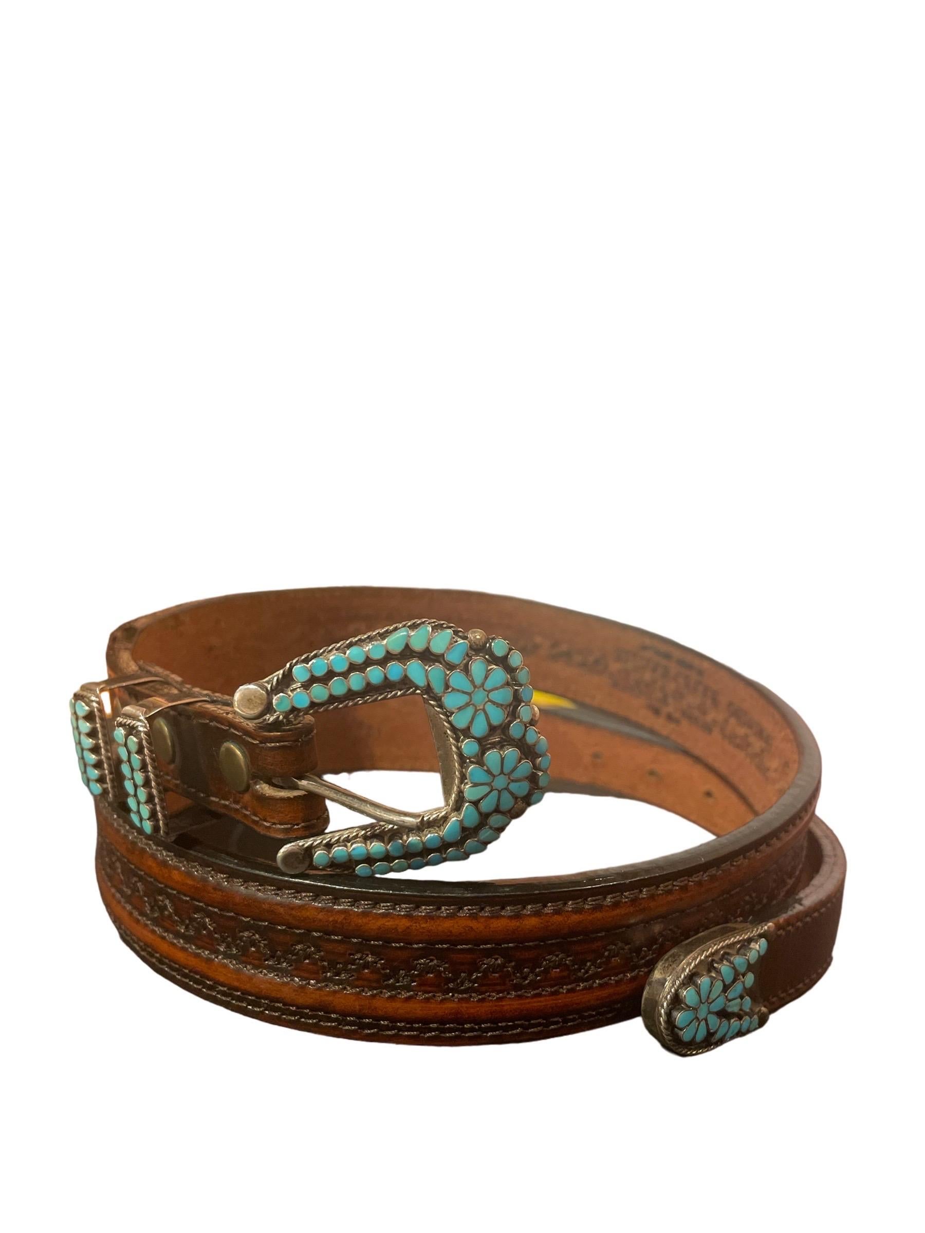 Stunning Vintage Native American Inlaid Turquoise, Silver & Hand-tooled Leather Belt 

Silver Creek Genuine leather stamped inside. Excellent condition! 

Size: 29”

Feel free to message us with any questions!