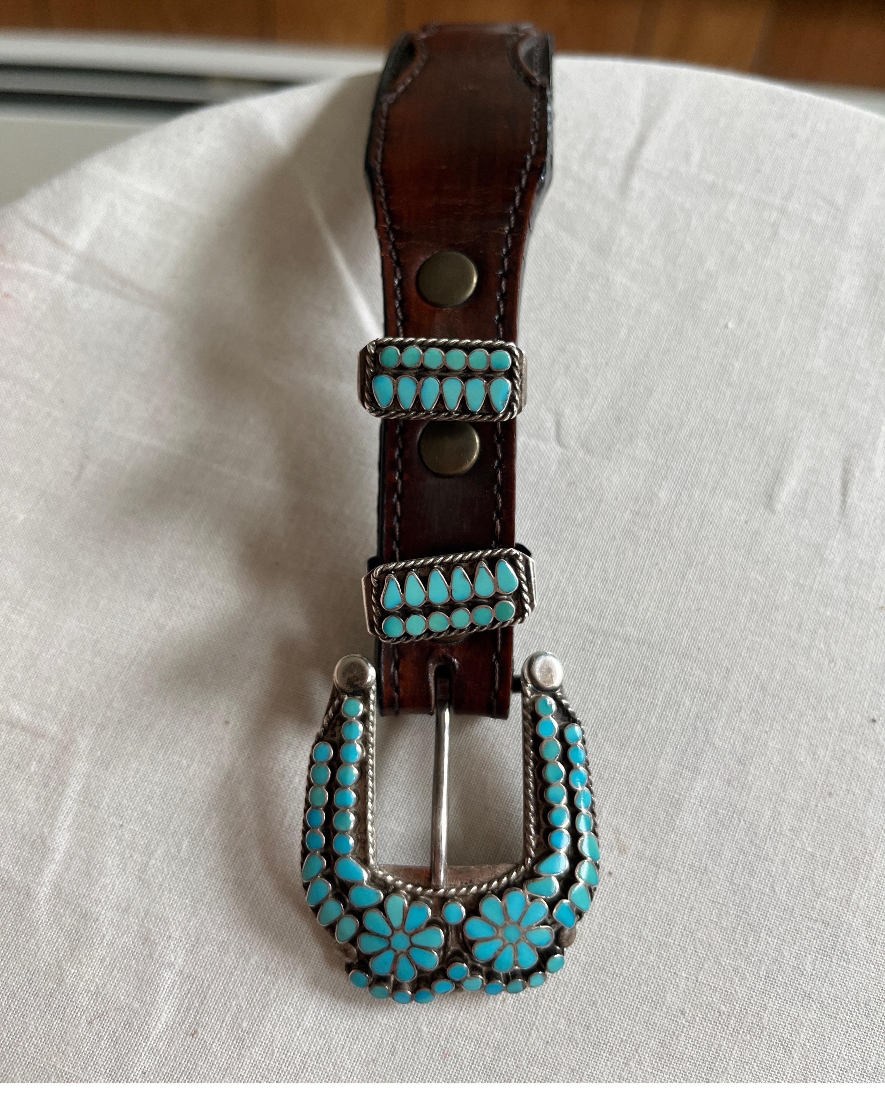 leather belt with turquoise buckle