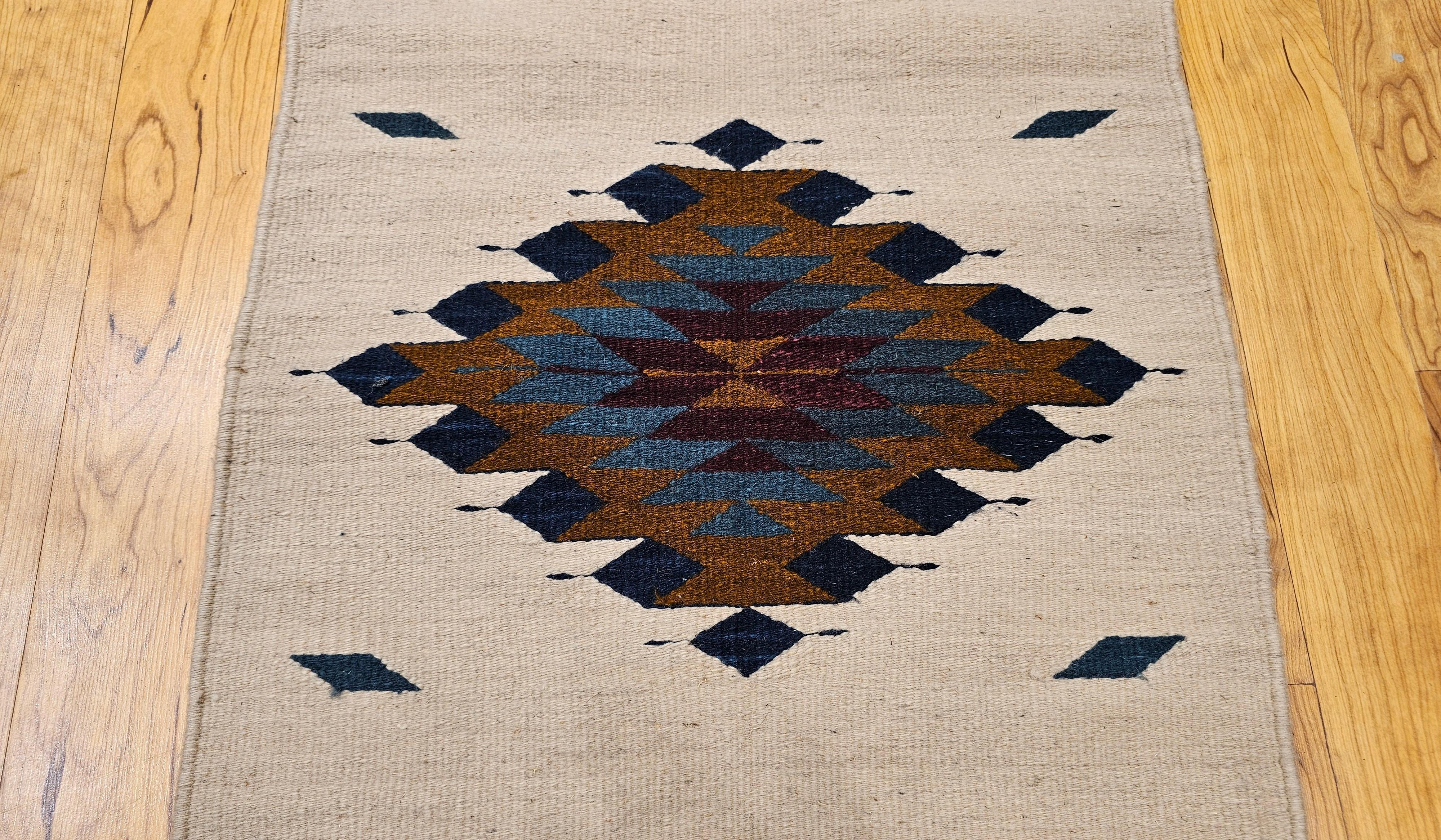 Vintage Native American Navajo Area Rug in Ivory, Blue, Burgundy & Brown In Good Condition For Sale In Barrington, IL