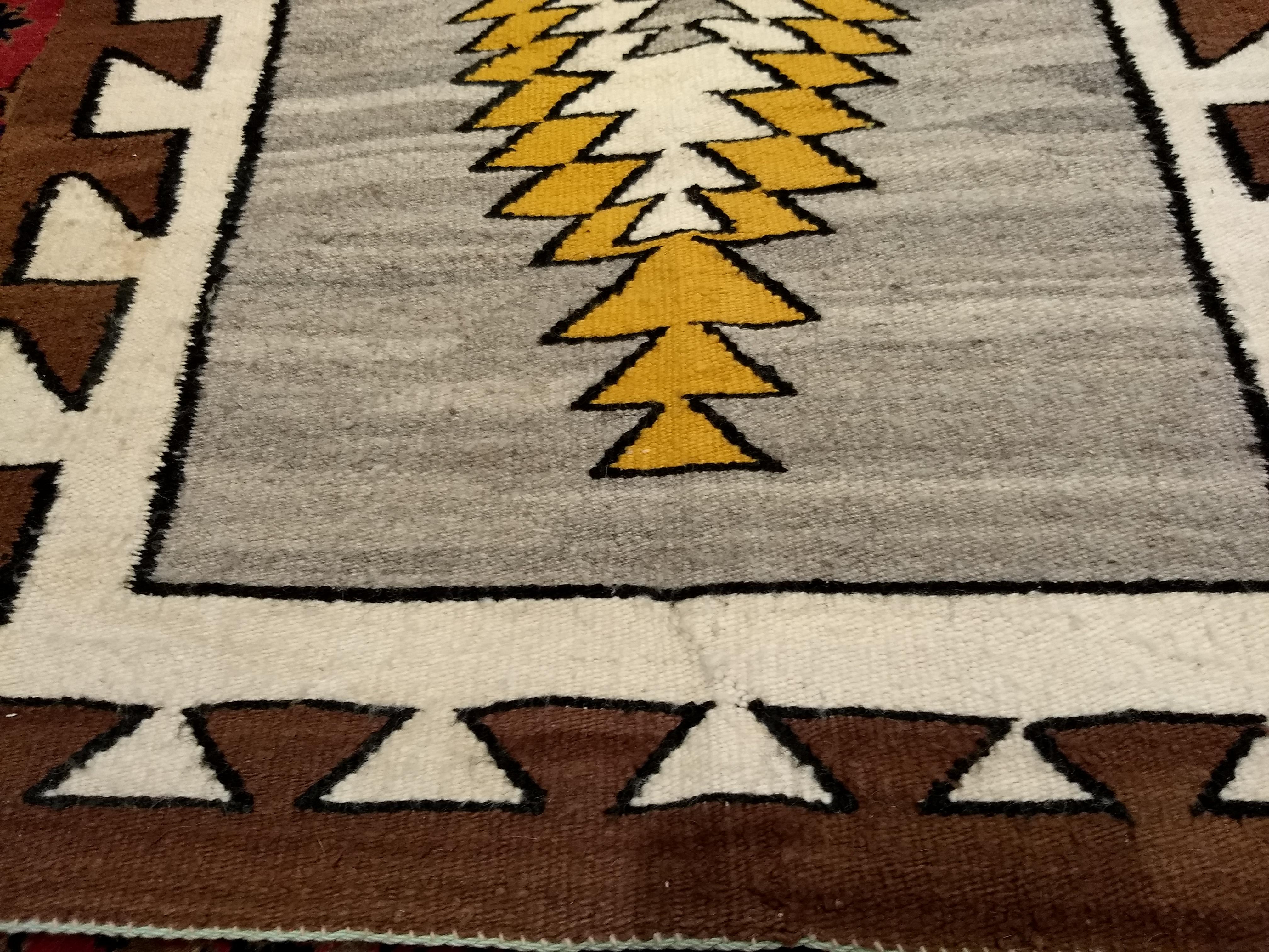 Vintage Native American Navajo Area Rug in a Striking Elongated Medallion Design For Sale 2
