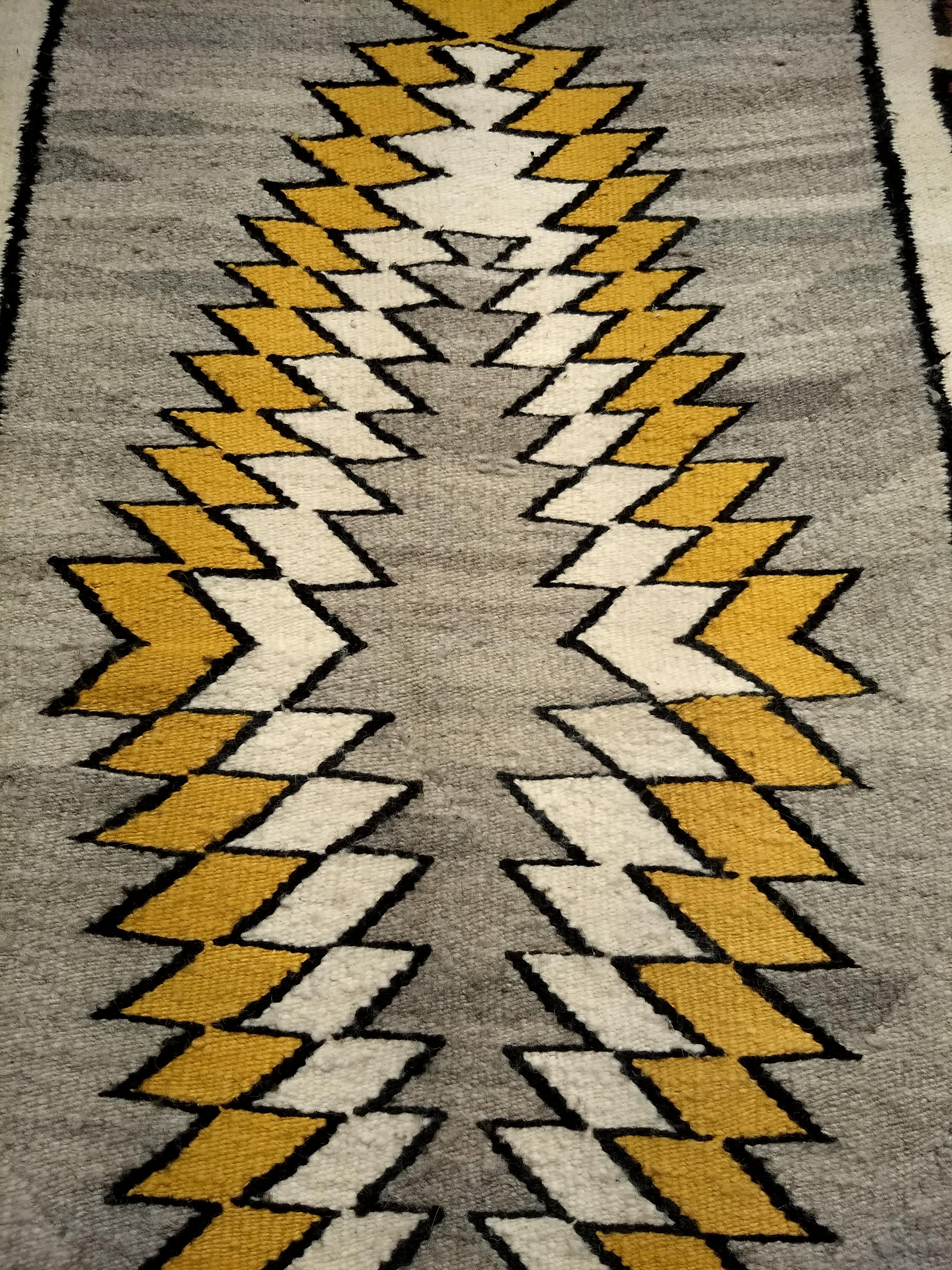 Mid-20th Century Vintage Native American Navajo Area Rug in a Striking Elongated Medallion Design For Sale