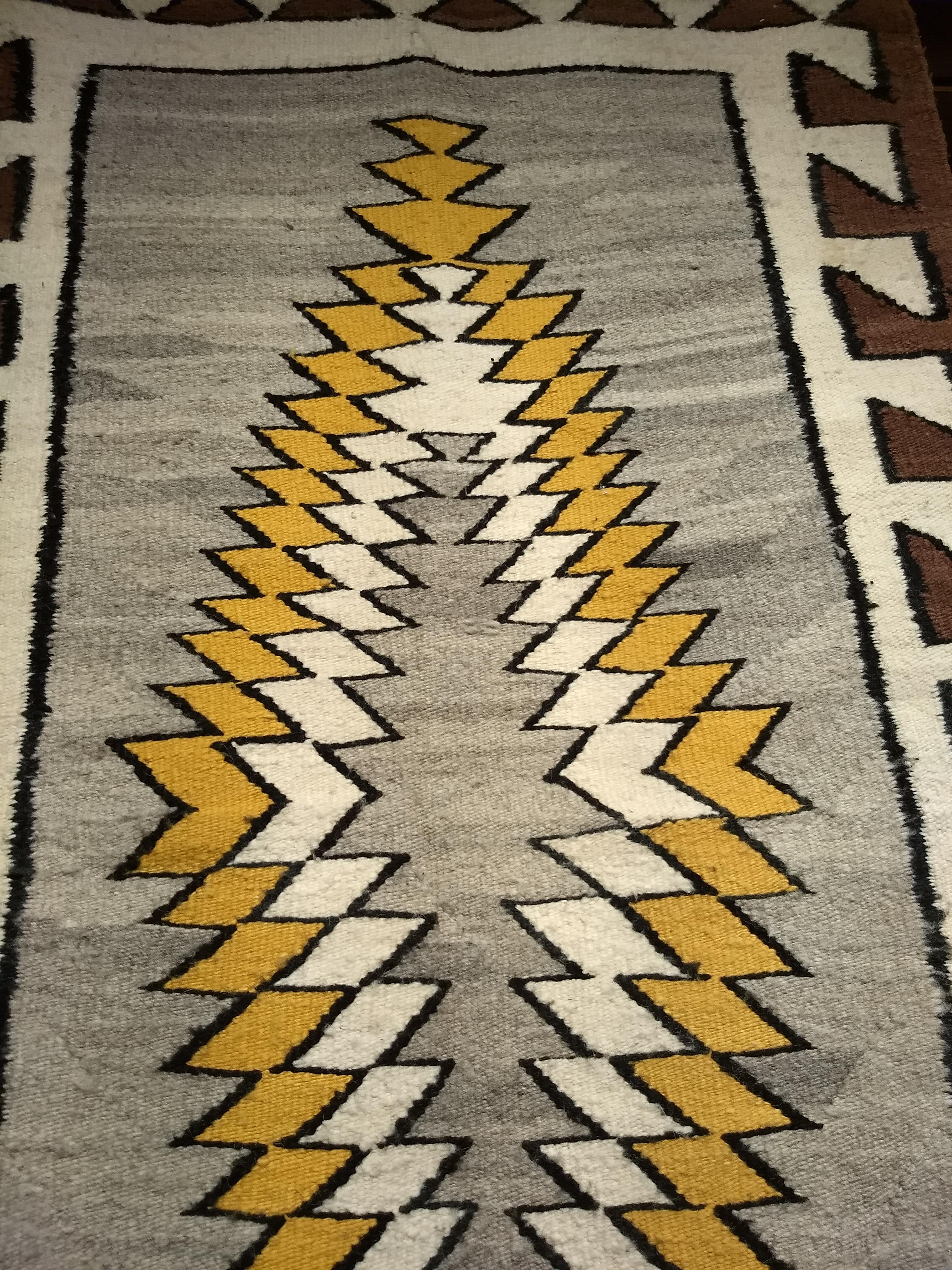 Wool Vintage Native American Navajo Area Rug in a Striking Elongated Medallion Design For Sale