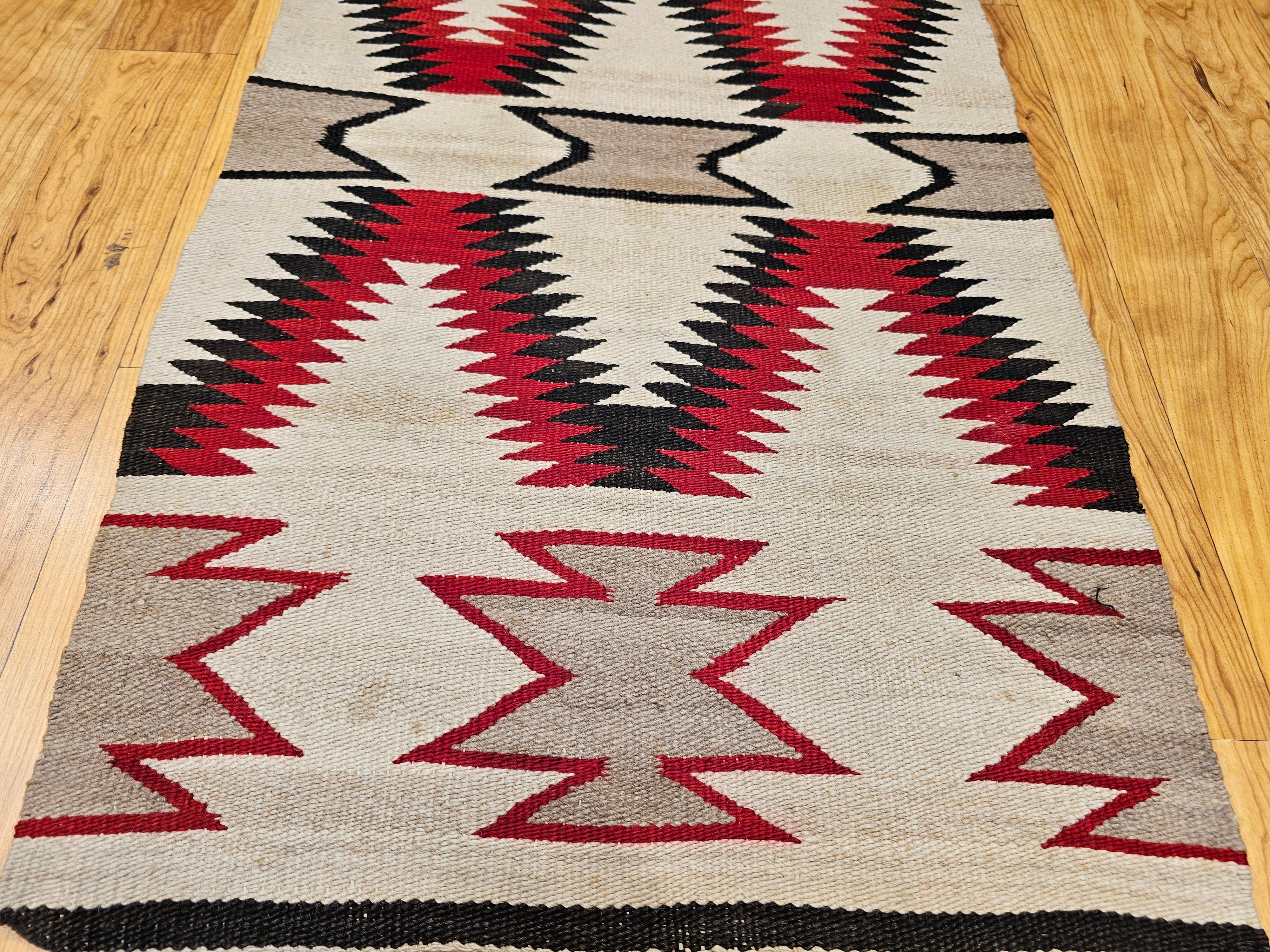 Hand-Woven Vintage Native American Navajo Area Rug in Eye Dazzler Pattern in Ivory, Red For Sale