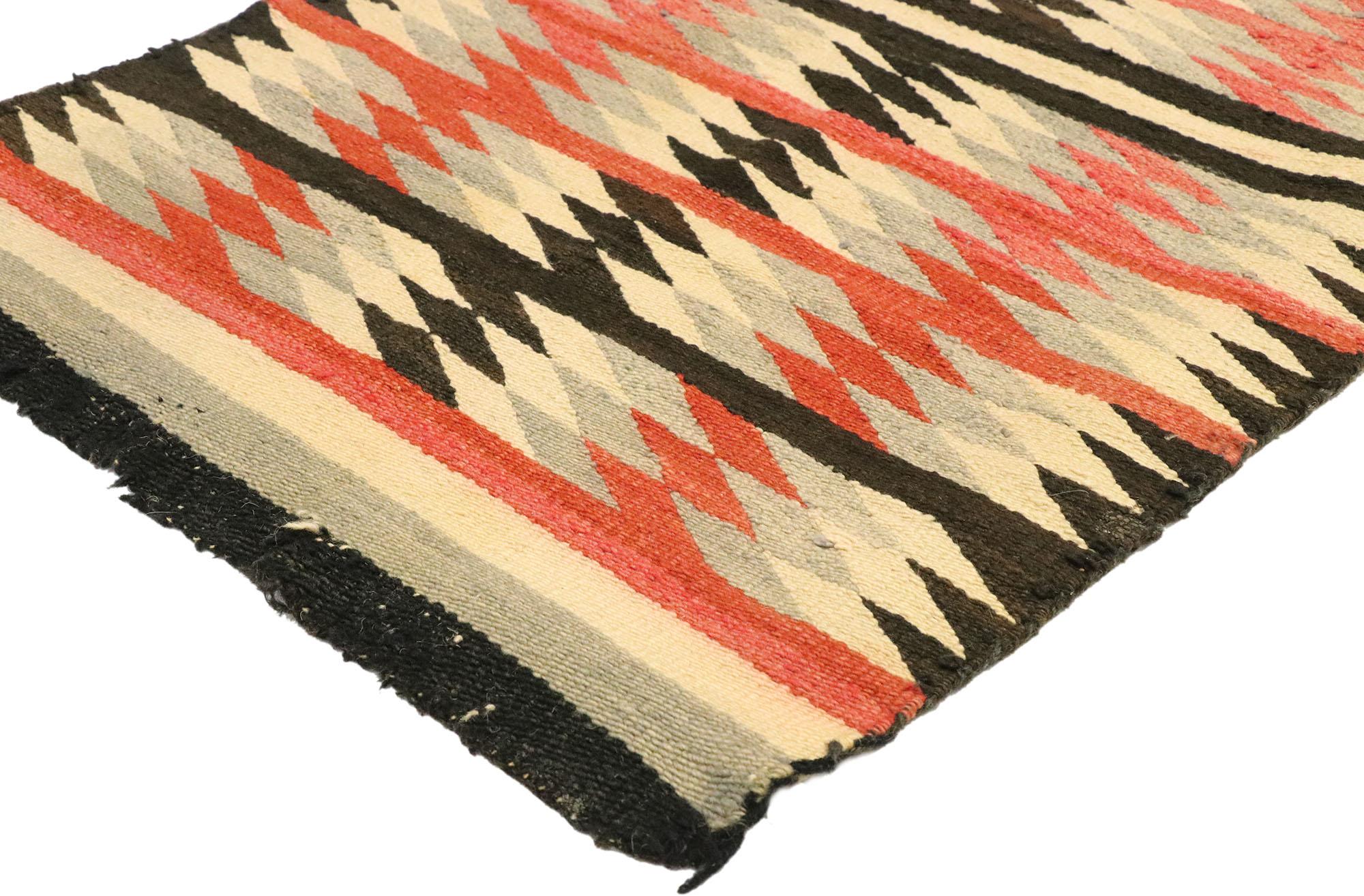 77489 vintage American Indian Navajo Kilim rug with two grey hills style. With its bold expressive design, incredible detail and texture, this handwoven wool vintage Navajo Kilim rug is a captivating vision of woven beauty highlighting Native