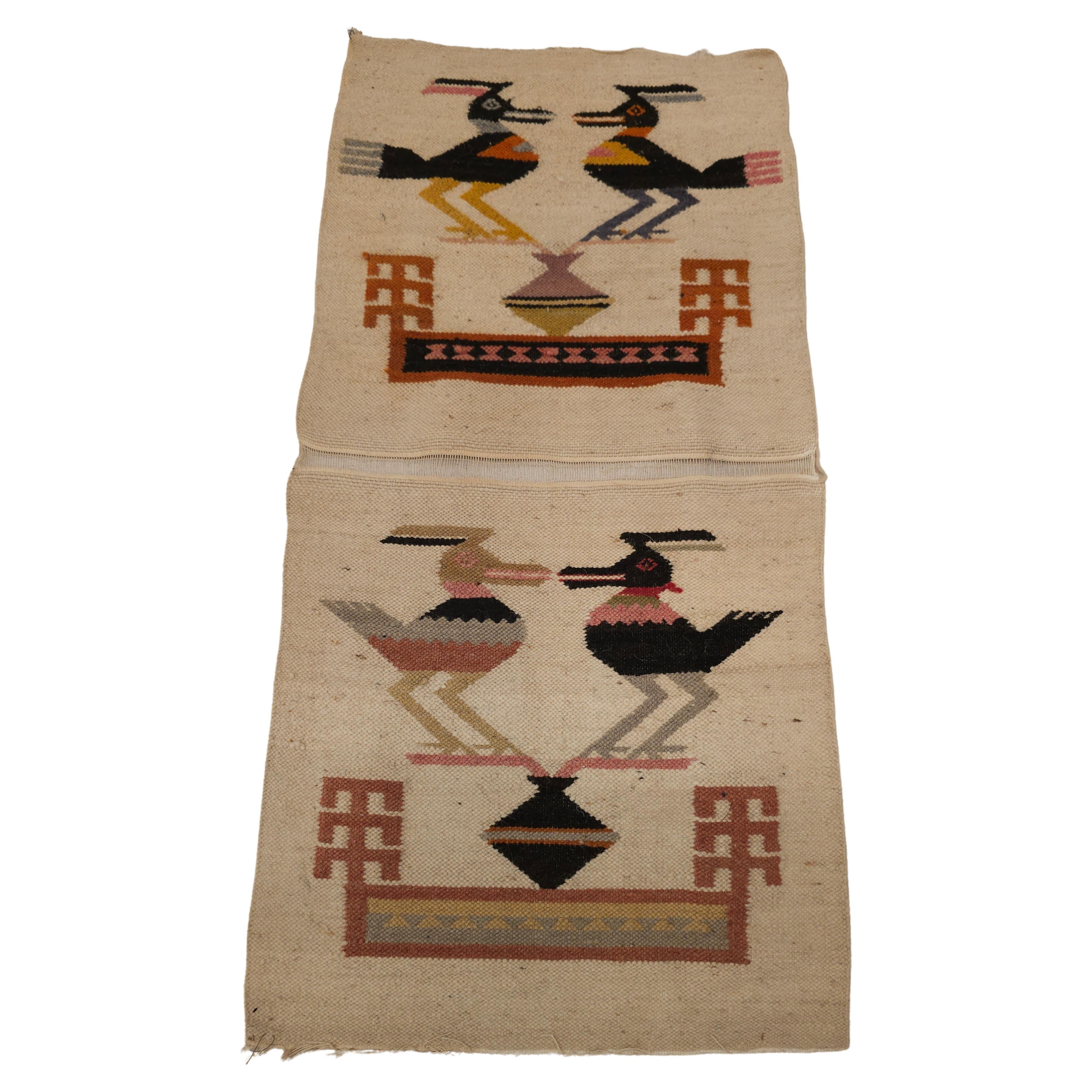 Vintage Native American Navajo Pictorial Rug with the Birds Design hand-woven in the SW United States in the mid 1900s. Because the birds can fly and be between earth and the skies, they have a special meaning in the Native American culture and are