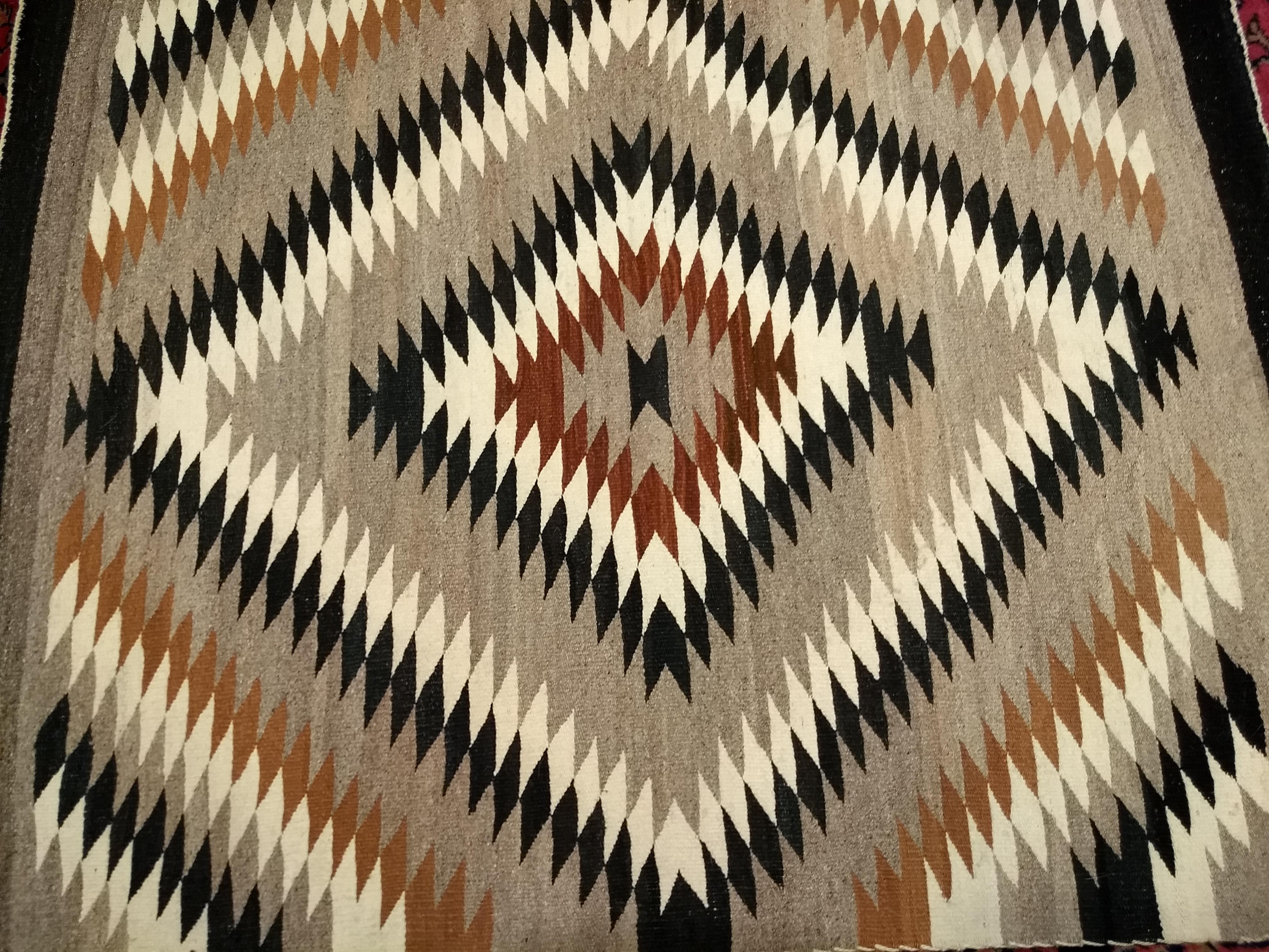 Vintage Native American Navajo Rug in Eye Dazzler Pattern in Earth Tone Colors For Sale 6