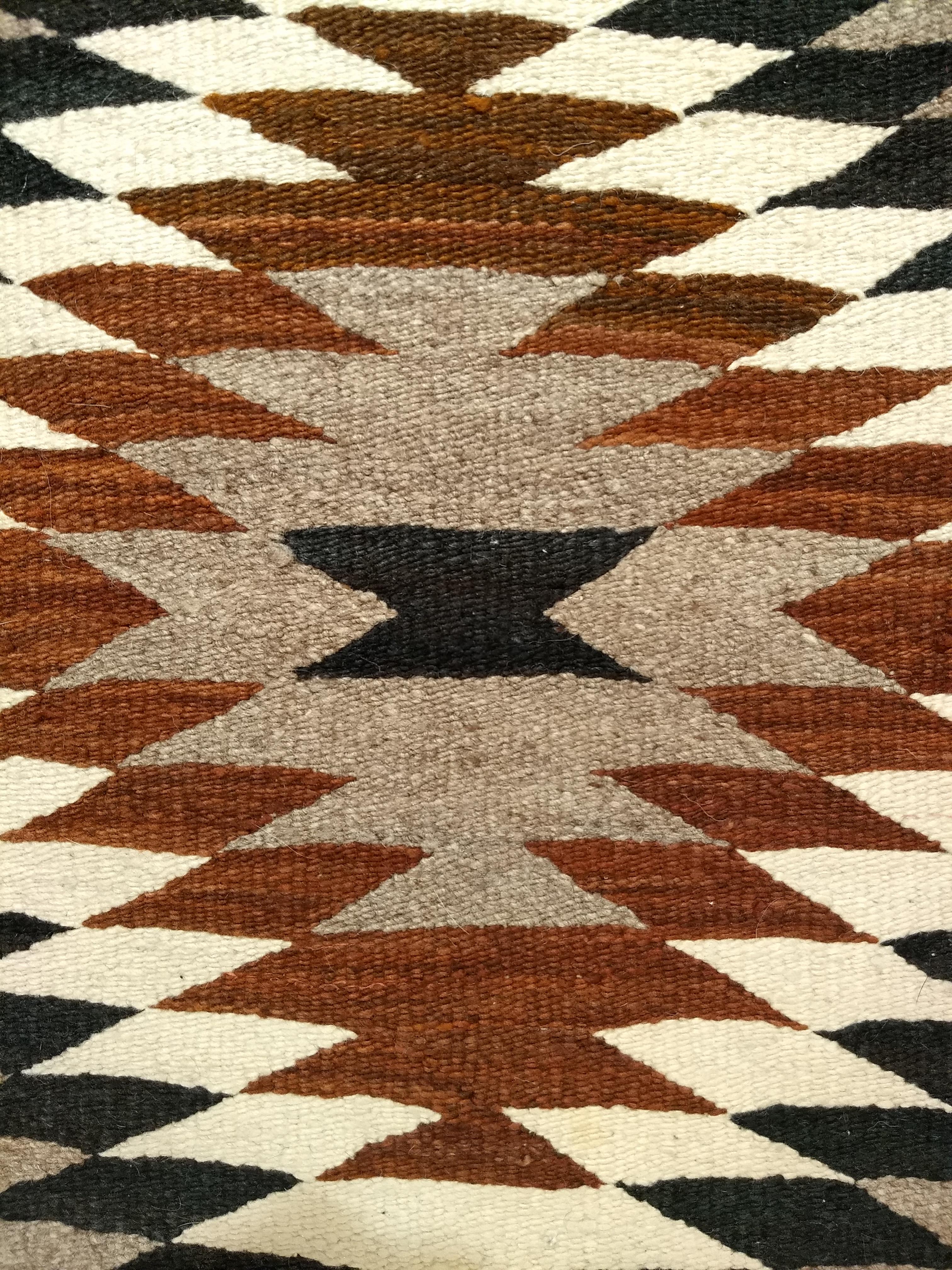 Vintage Native American Navajo Rug in Eye Dazzler Pattern in Earth Tone Colors For Sale 1