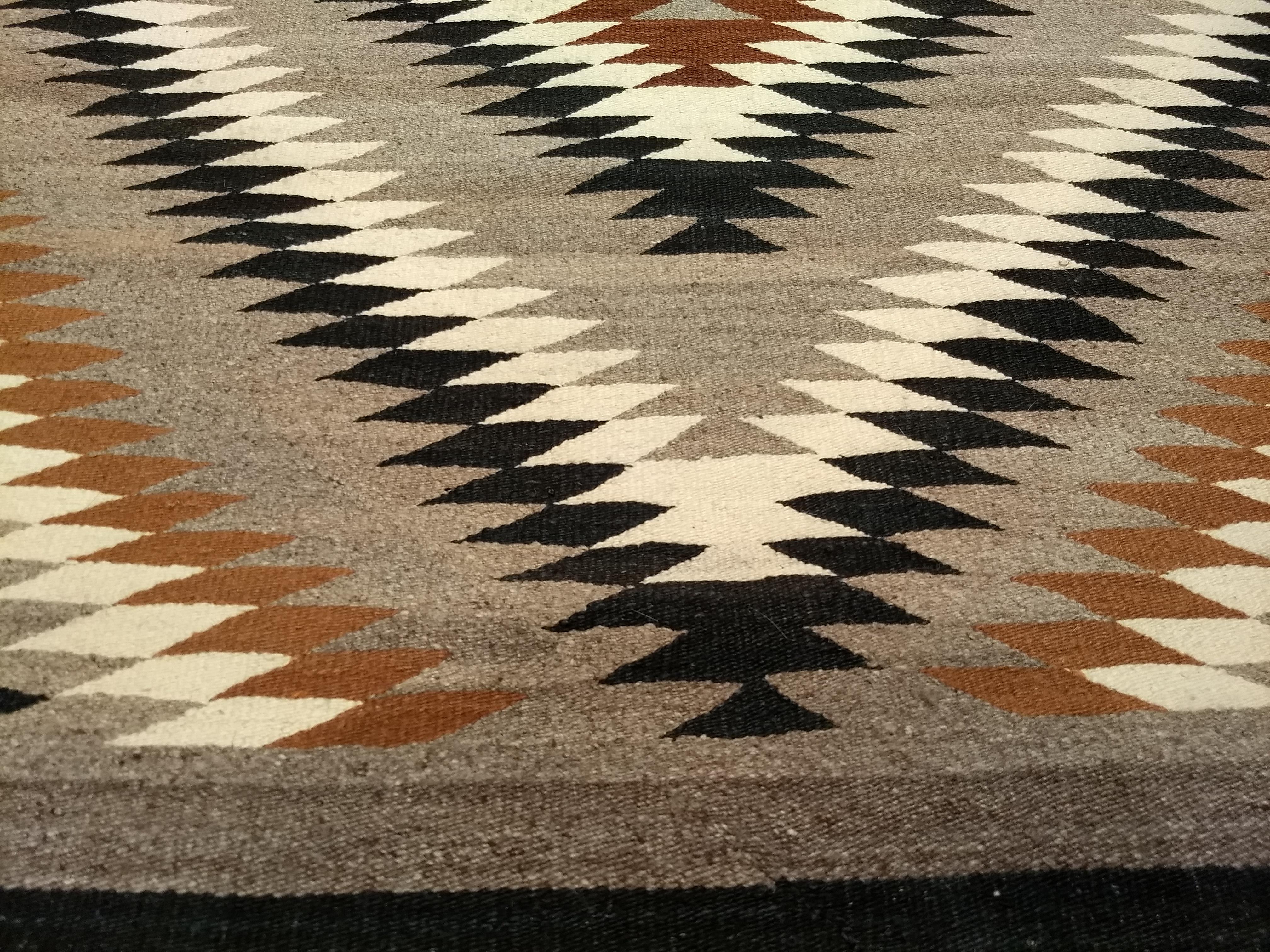 Vintage Native American Navajo Rug in Eye Dazzler Pattern in Earth Tone Colors For Sale 2