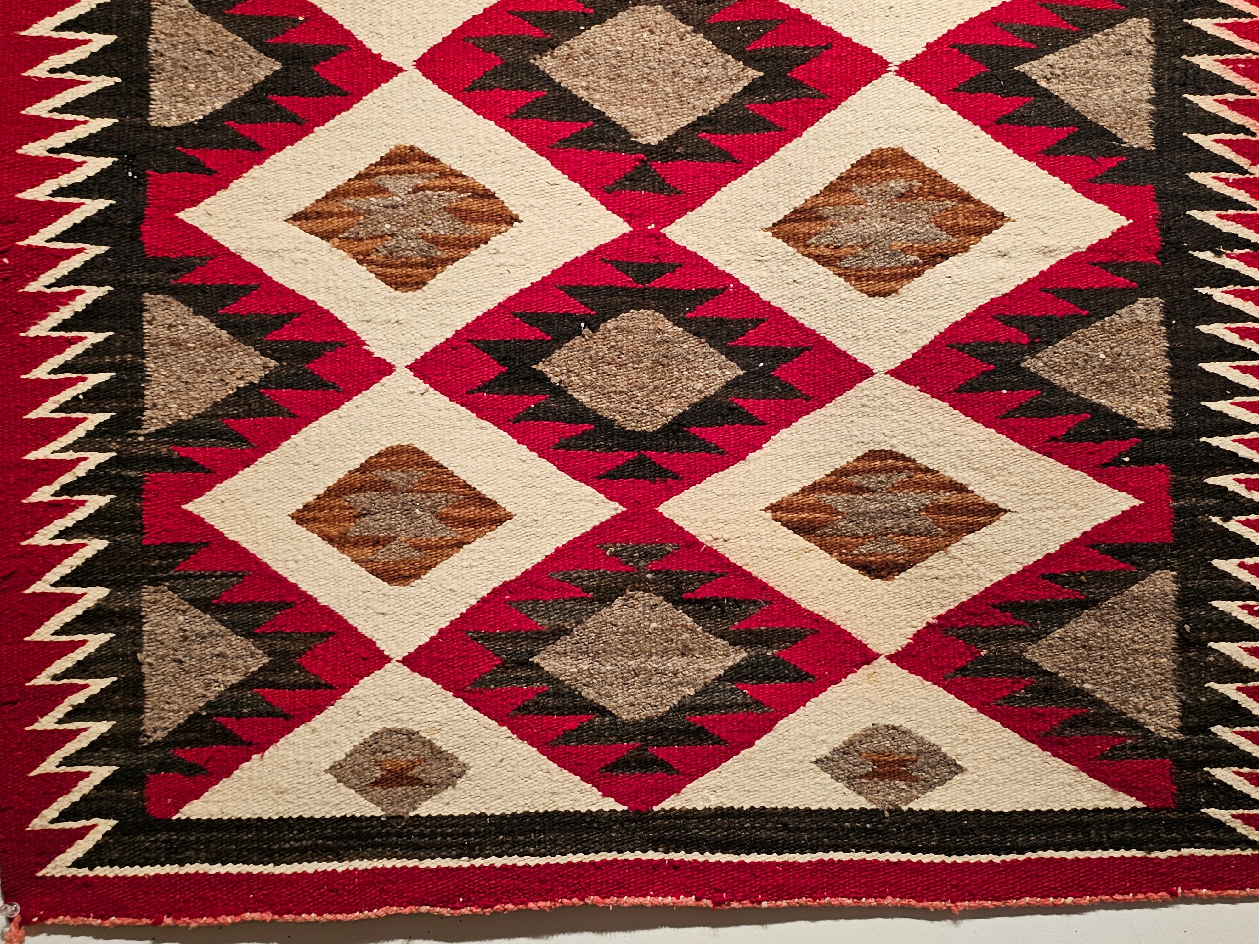 Hand-Knotted Vintage American Navajo Rug in Eye Dazzler Pattern in Red, Ivory, Gray, Black For Sale