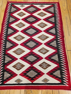 Vintage Native American Navajo Area Rug in Eye Dazzler Pattern in Red, Ivory