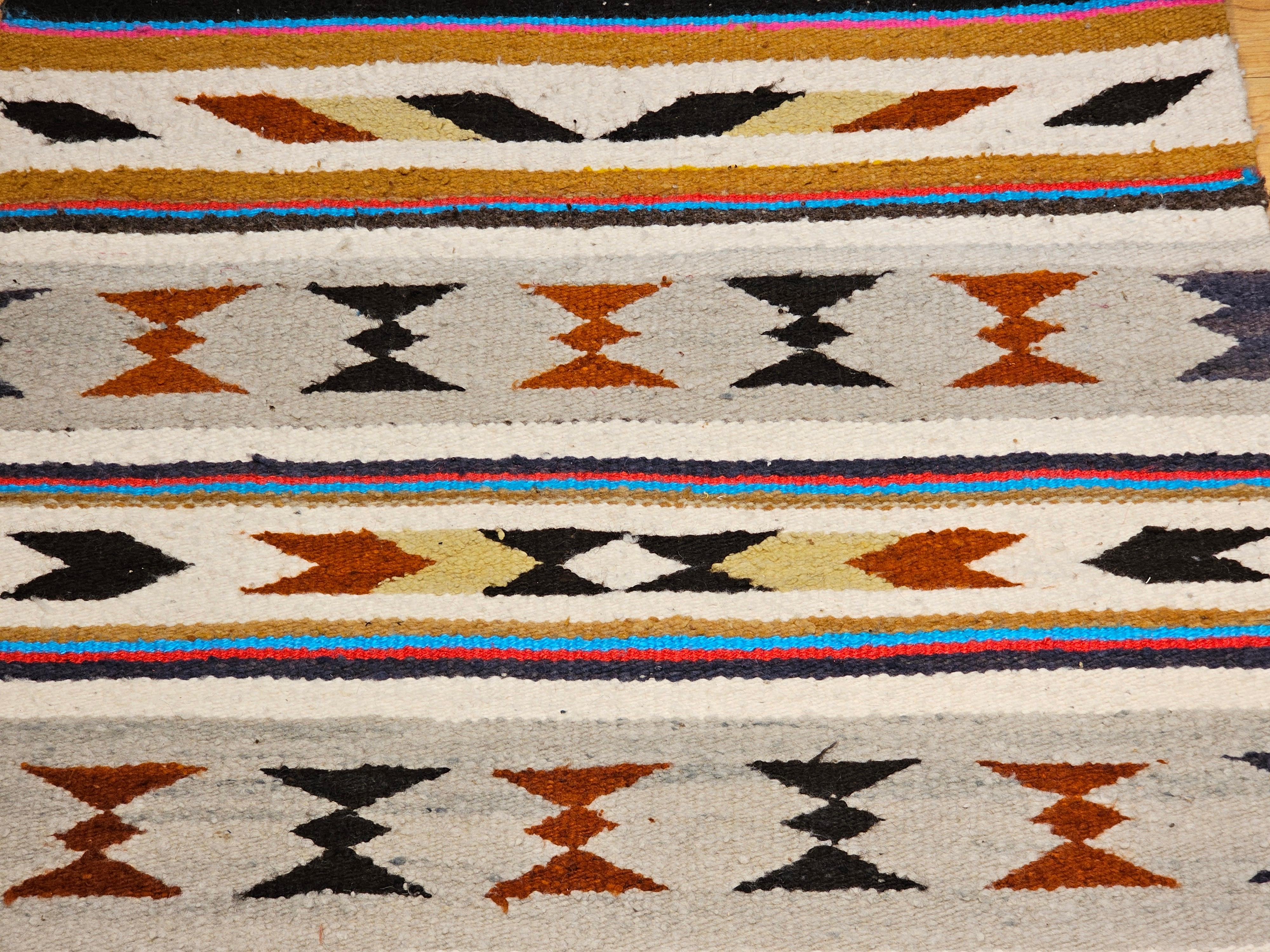 Wool Vintage American Navajo Saddle Blanket in Stripe Pattern in Ivory, Brown, Red For Sale