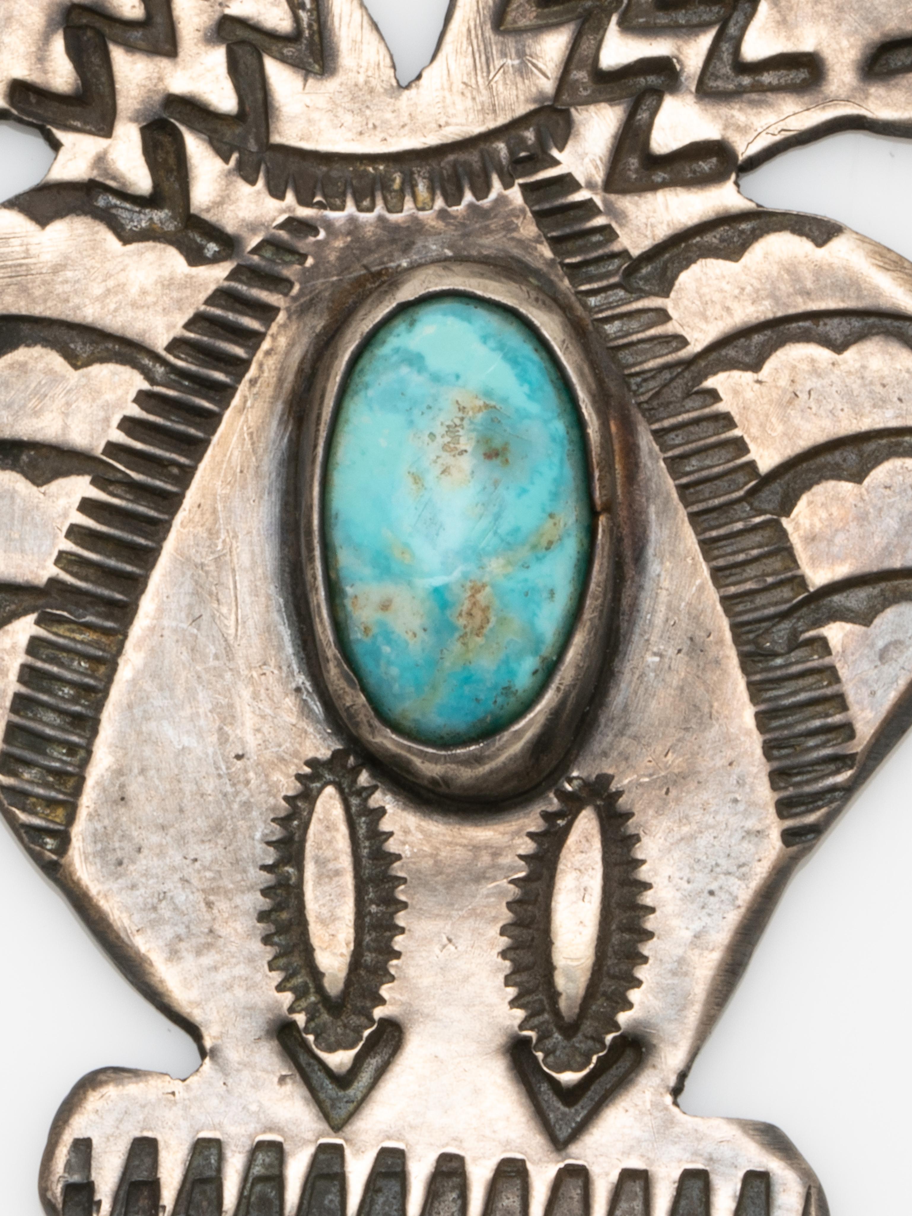 Vintage Native American Navajo Sterling Silver and Turquoise Double Thunderbird Charm Pendant

A wonderful protective amulet, heavy and substantial

5.82 grams