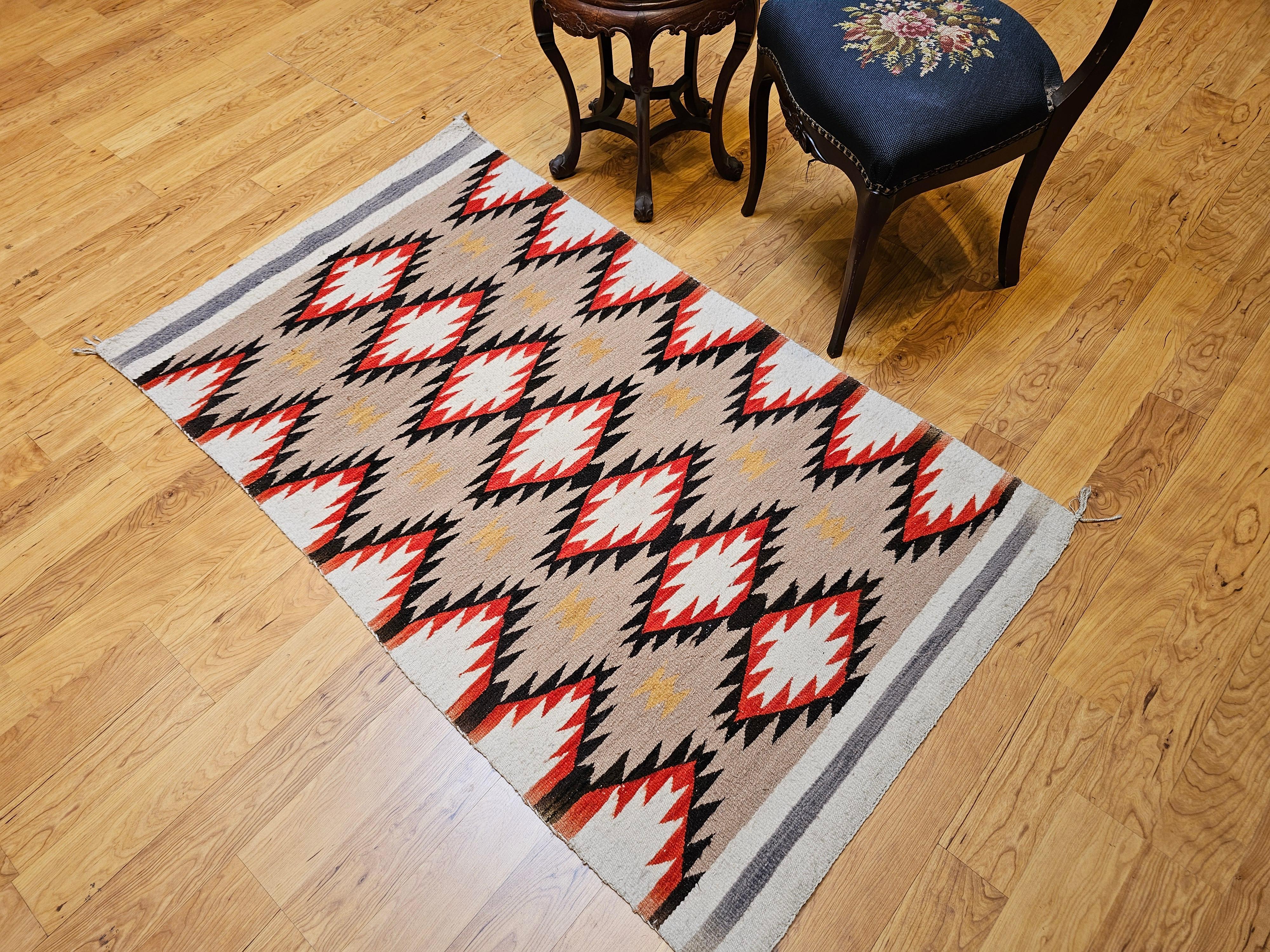 Vintage Native Navajo Rug in Diamond Pattern in Ivory, Black, Red, Tan, Gray For Sale 1