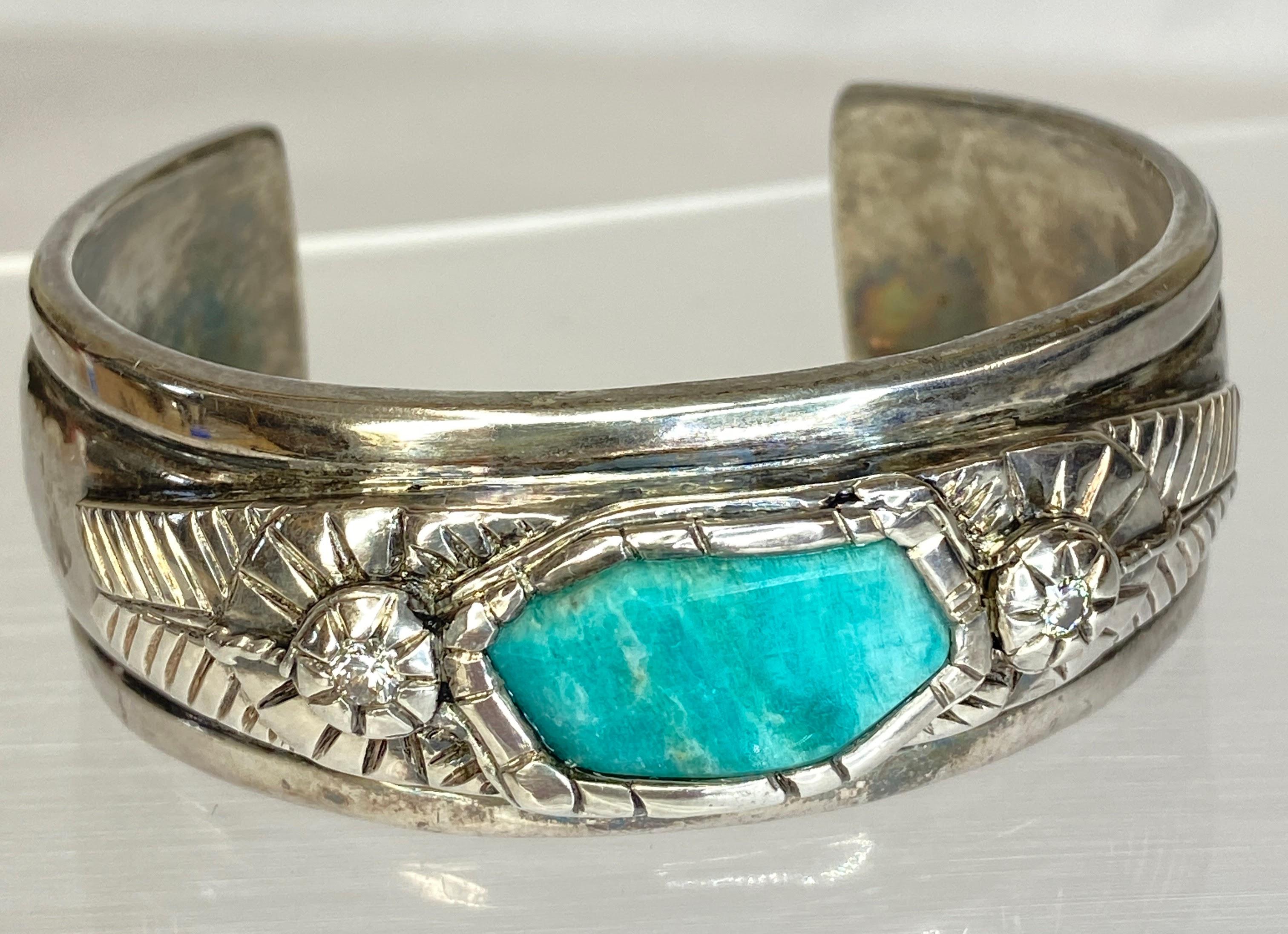 Sterling Silver Early Native Cuff Bracelet 5.83TCW Diamonds & Amazonite


Metal Purity: 925
Metal Type: Silver
Main Stone: Amazonite
Stone Size/Carats: 11.4mm x 22.8mm/ 5.61ct (by formula)
Second Stone: Diamond
Stone Size/Carats: 2.9mm round/ 0.11ct
