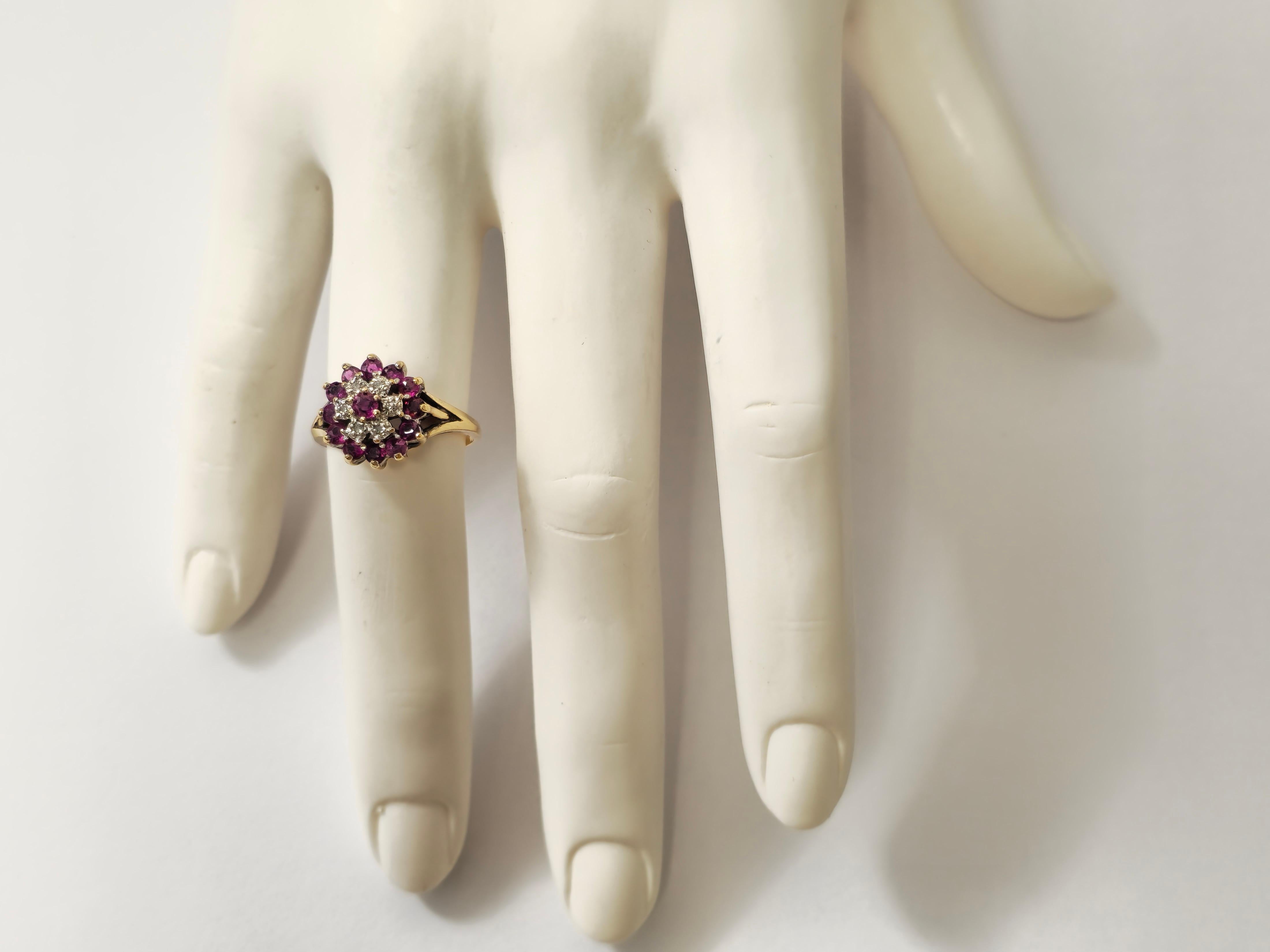 Embrace timeless elegance with our Vintage Ruby and Diamond Ring, crafted from luxurious 14k yellow gold. Featuring a captivating 1.20 carat total round-shaped ruby and accentuated by 0.12 carats of round-cut diamonds, this ring exudes