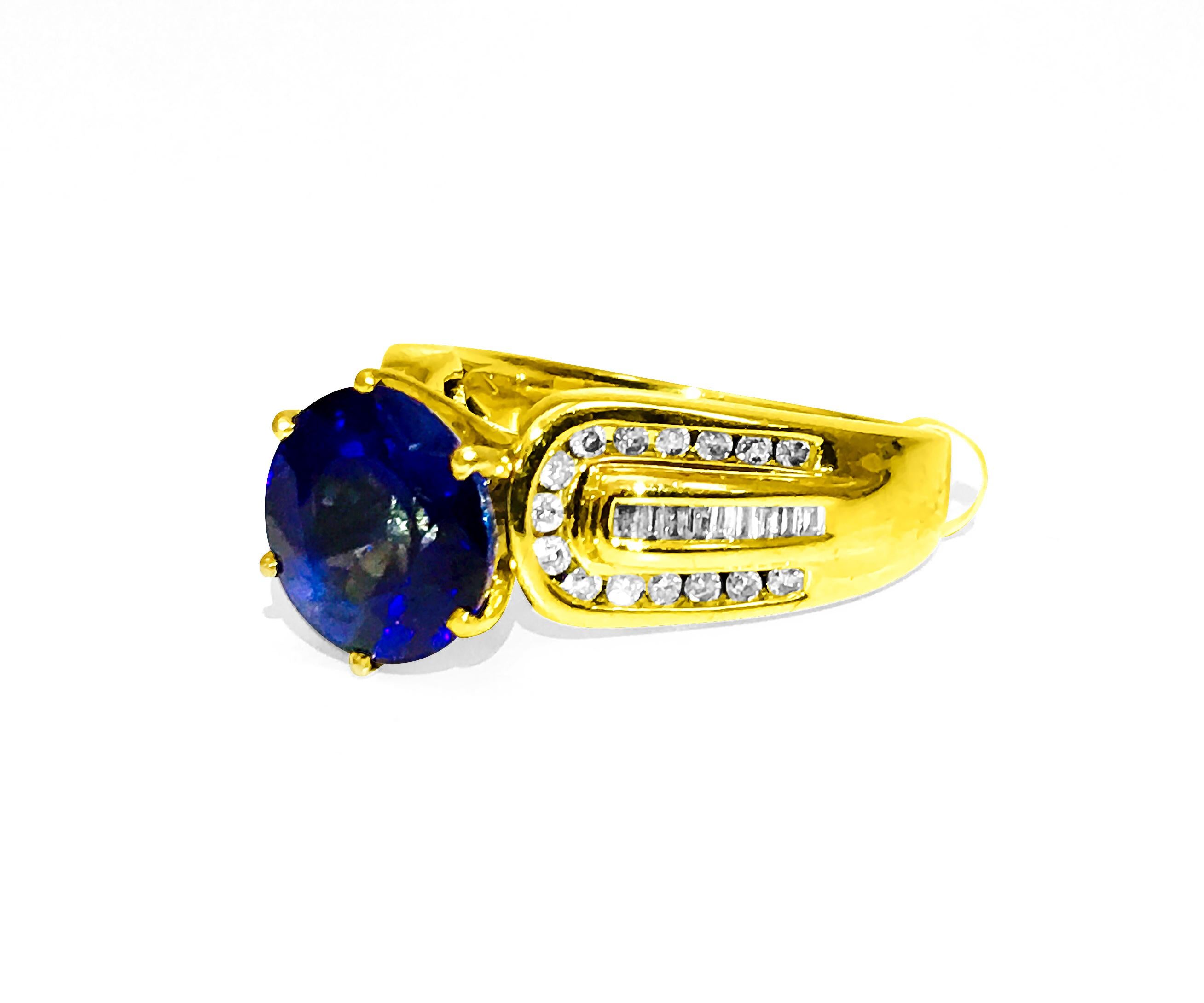 Elevate your style with our Vintage Blue Sapphire and Diamond Ring, crafted in 14K Yellow Gold. A mesmerizing 6.00-carat natural earth-mined blue sapphire steals the spotlight, complemented by 1.00 carat total round brilliant and baguette cut
