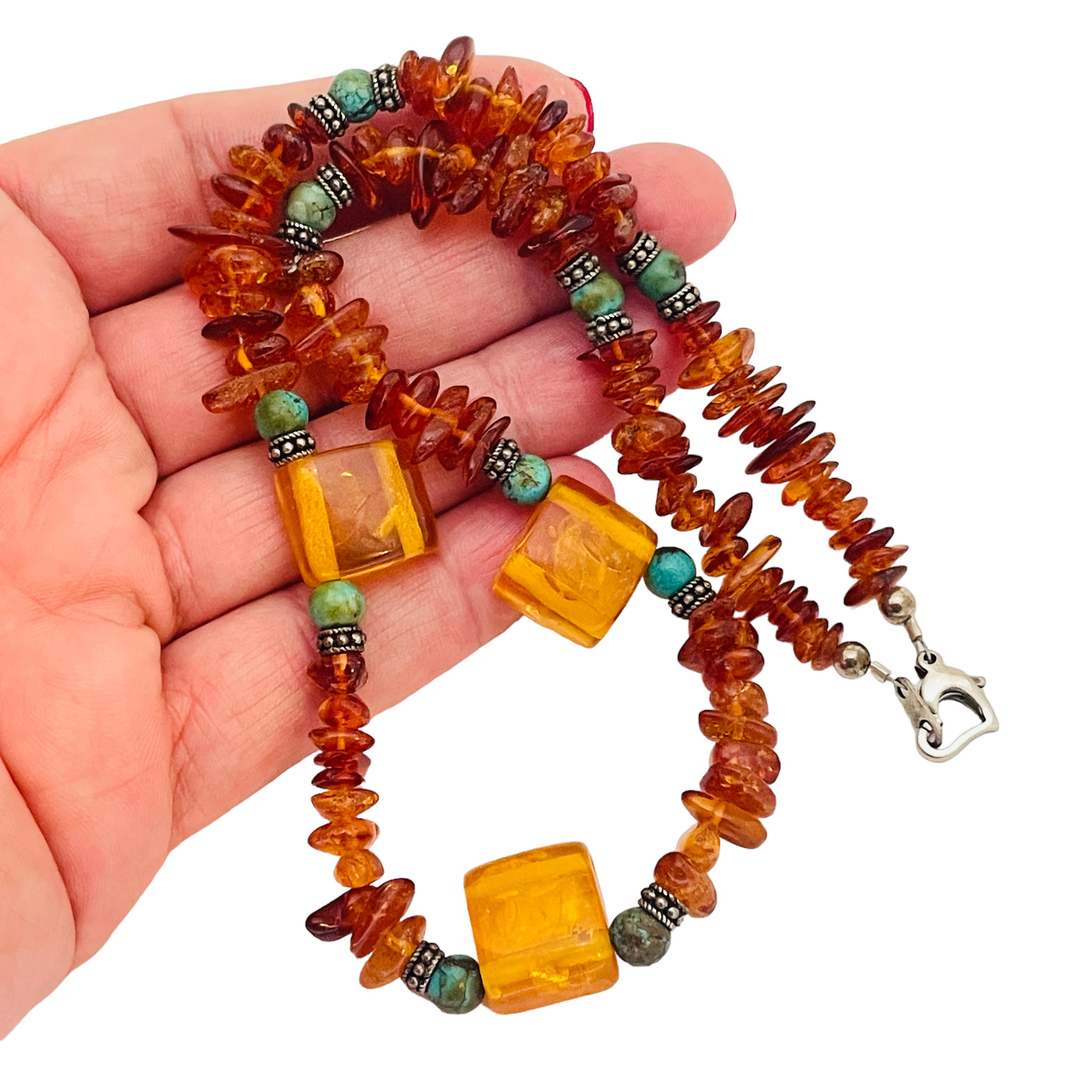 DETAILS

•  stamped 925 on clasp 

• natural amber beads

• vintage amber necklace  

MEASUREMENTS  

• 

CONDITION

•  excellent vintage condition with minimal signs of wear 

 Sku 35