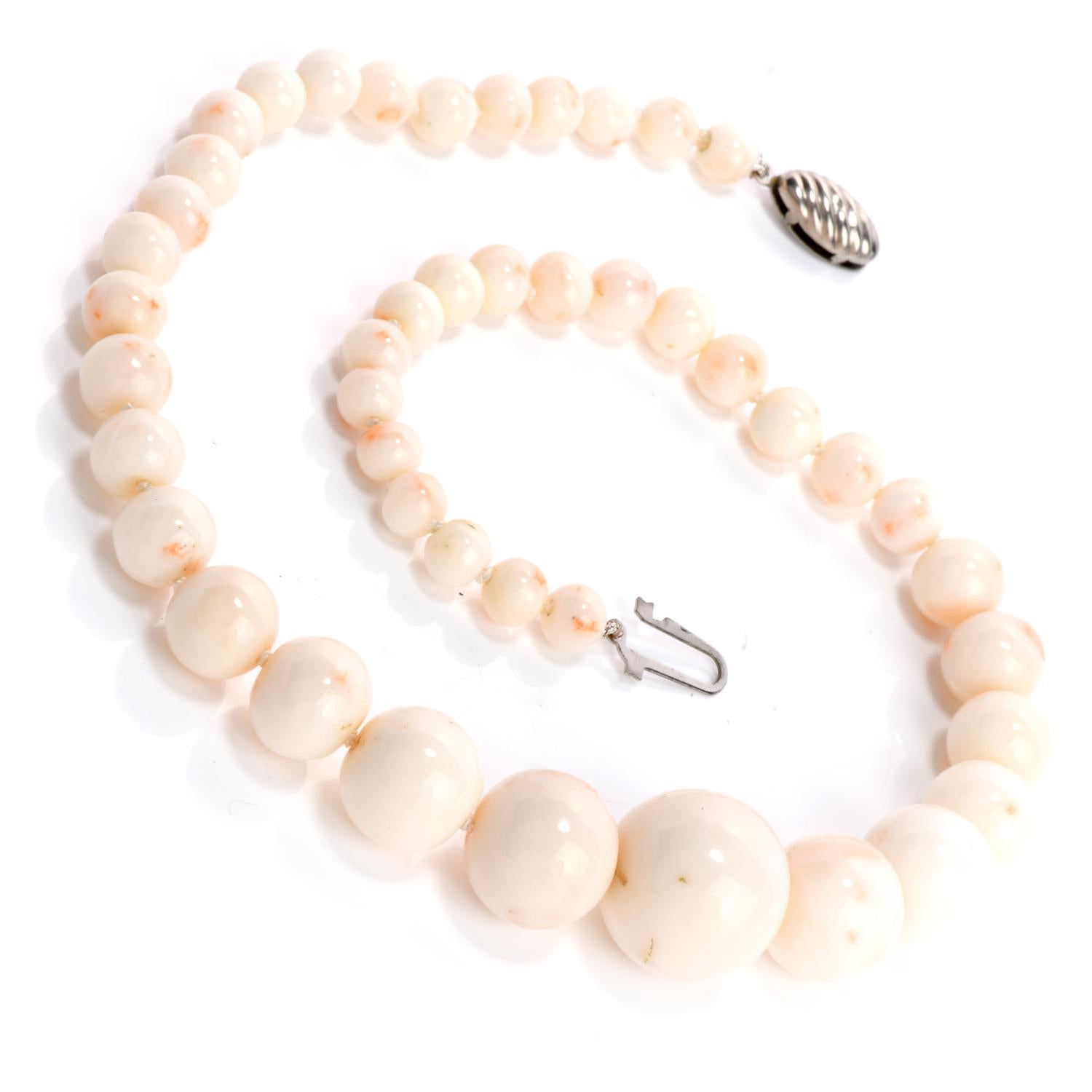 Curate your very own distinguished jewelry style with this 1960s Vintage Natural Angel Hair Coral Graduated Bead Necklace. 

45 ivory and coral marbled beads are stranded together to accumulate 17 Inches in length. 

Each beautiful bead ranges from