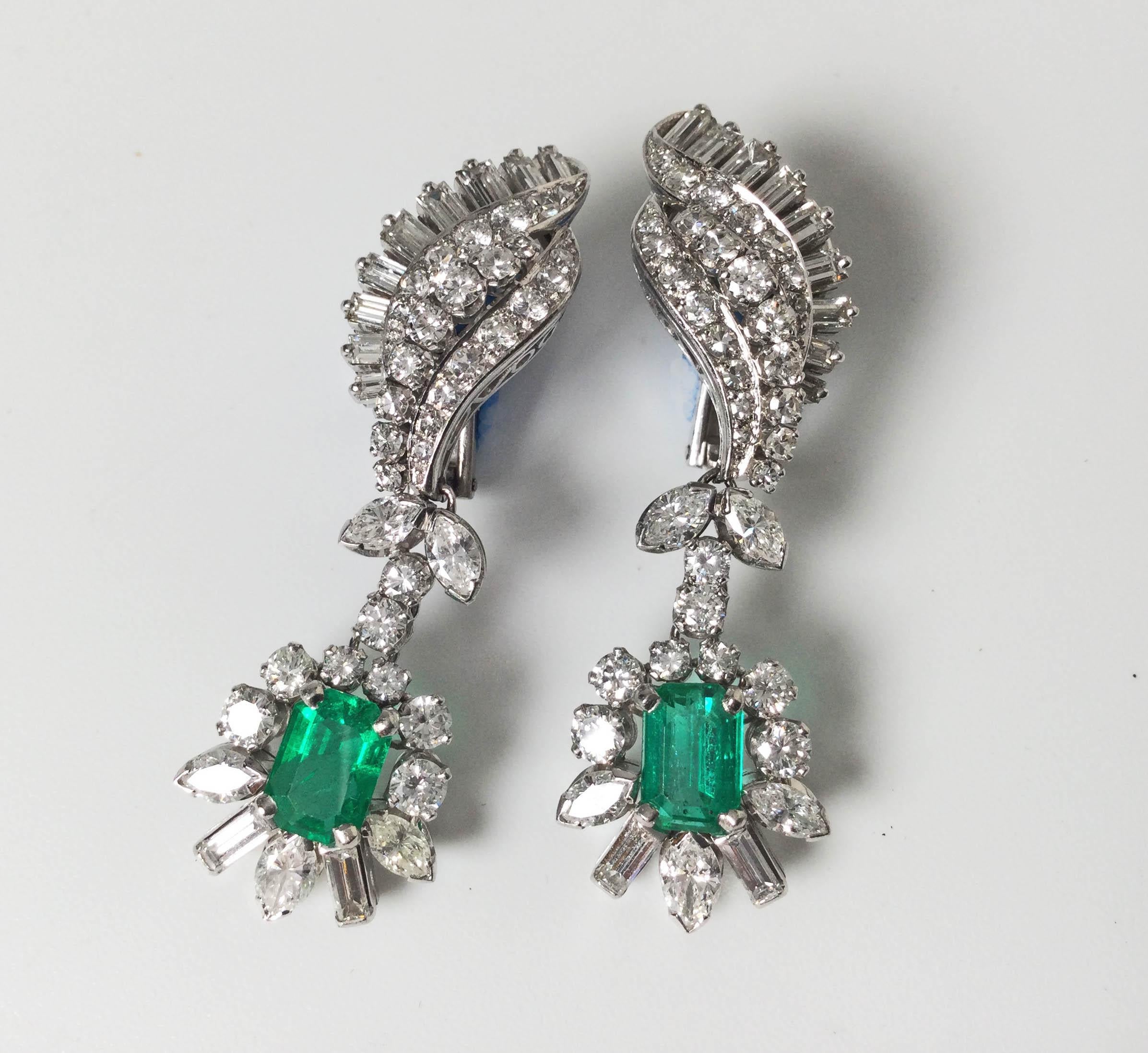Stunning estate Columbian emerald and 18k white gold earrings.
 