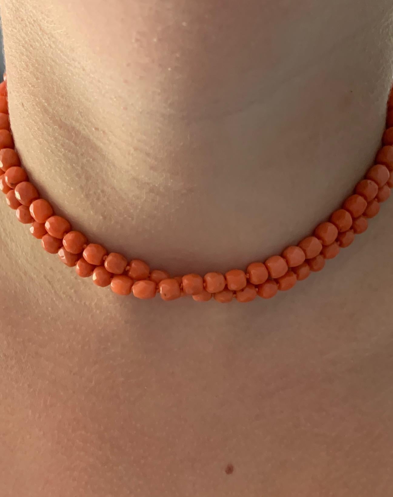 This vintage necklace features natural Coral beads which are faceted and graduated in size.  The necklace is 30