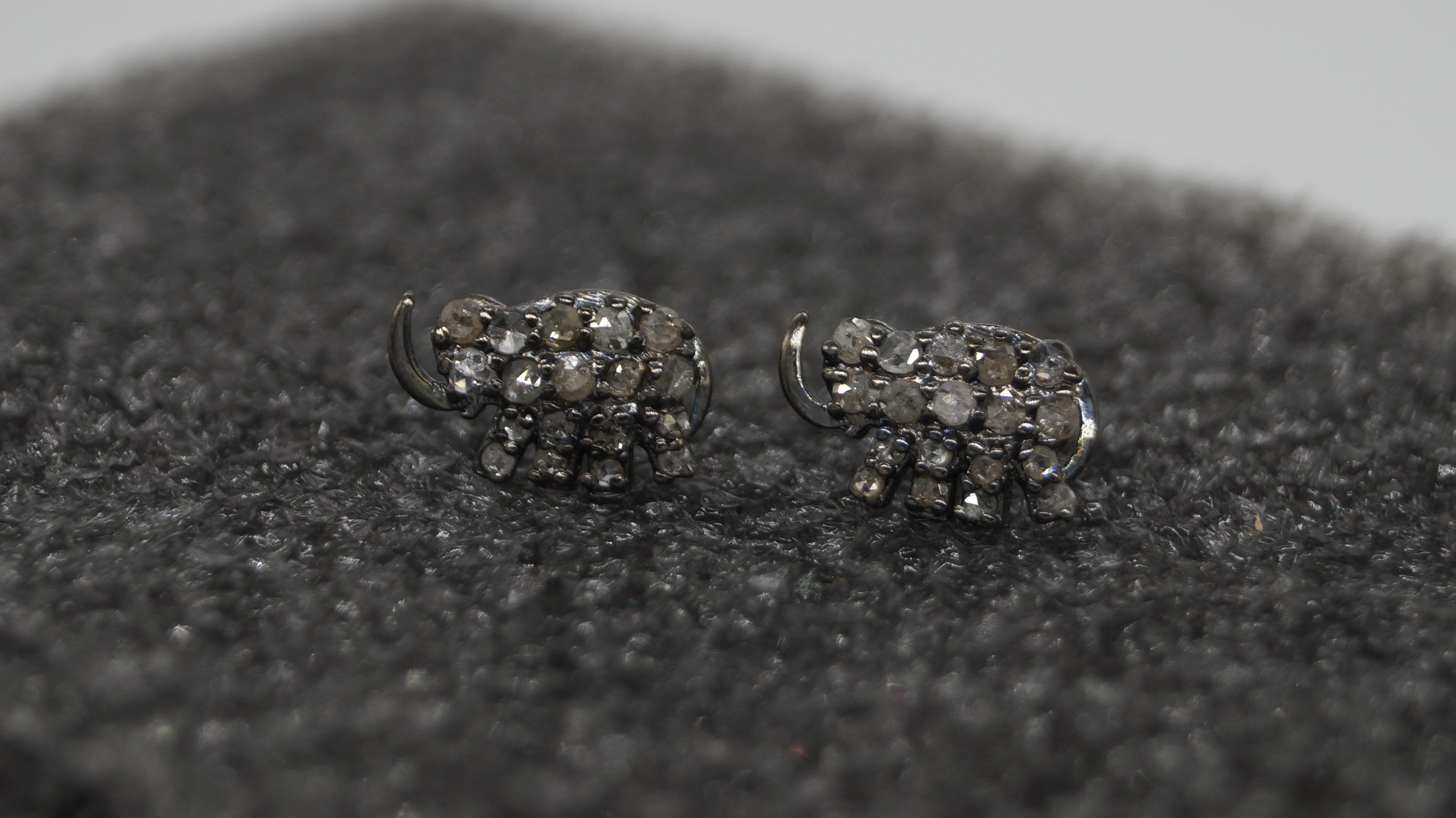 This pair of earrings have natural real diamonds. It is made up of sterling silver. It comes with a certificate of authenticity.
