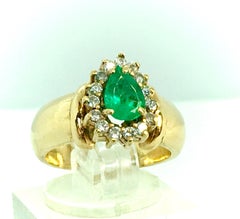 Bague vintage en or 18 carats avec émeraude naturelle et diamants