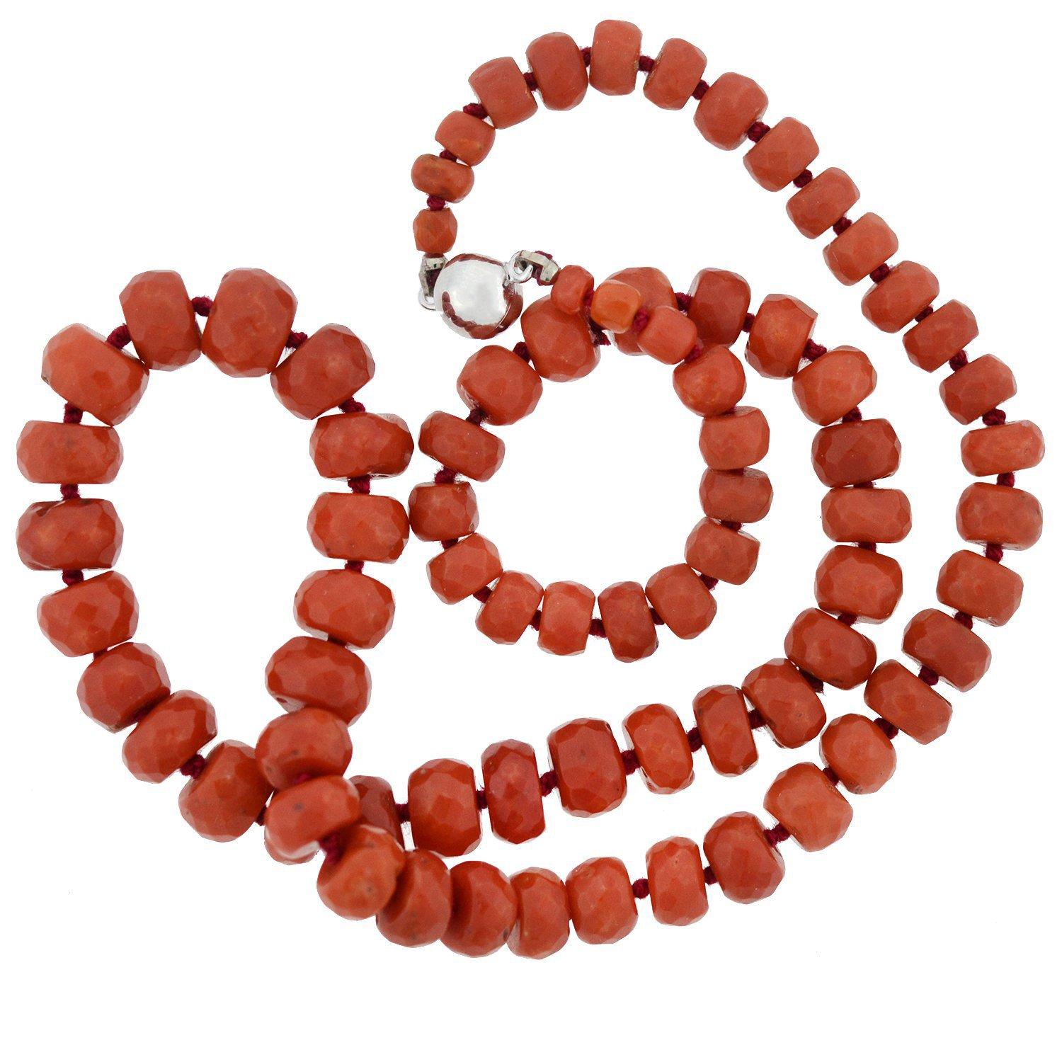 This vintage coral bead necklace is simply stunning! The simple design features a row of graduating coral beads, which are hand strung on red thread, and knotted in between. The coral is natural and untreated, displaying a beautiful range of deep