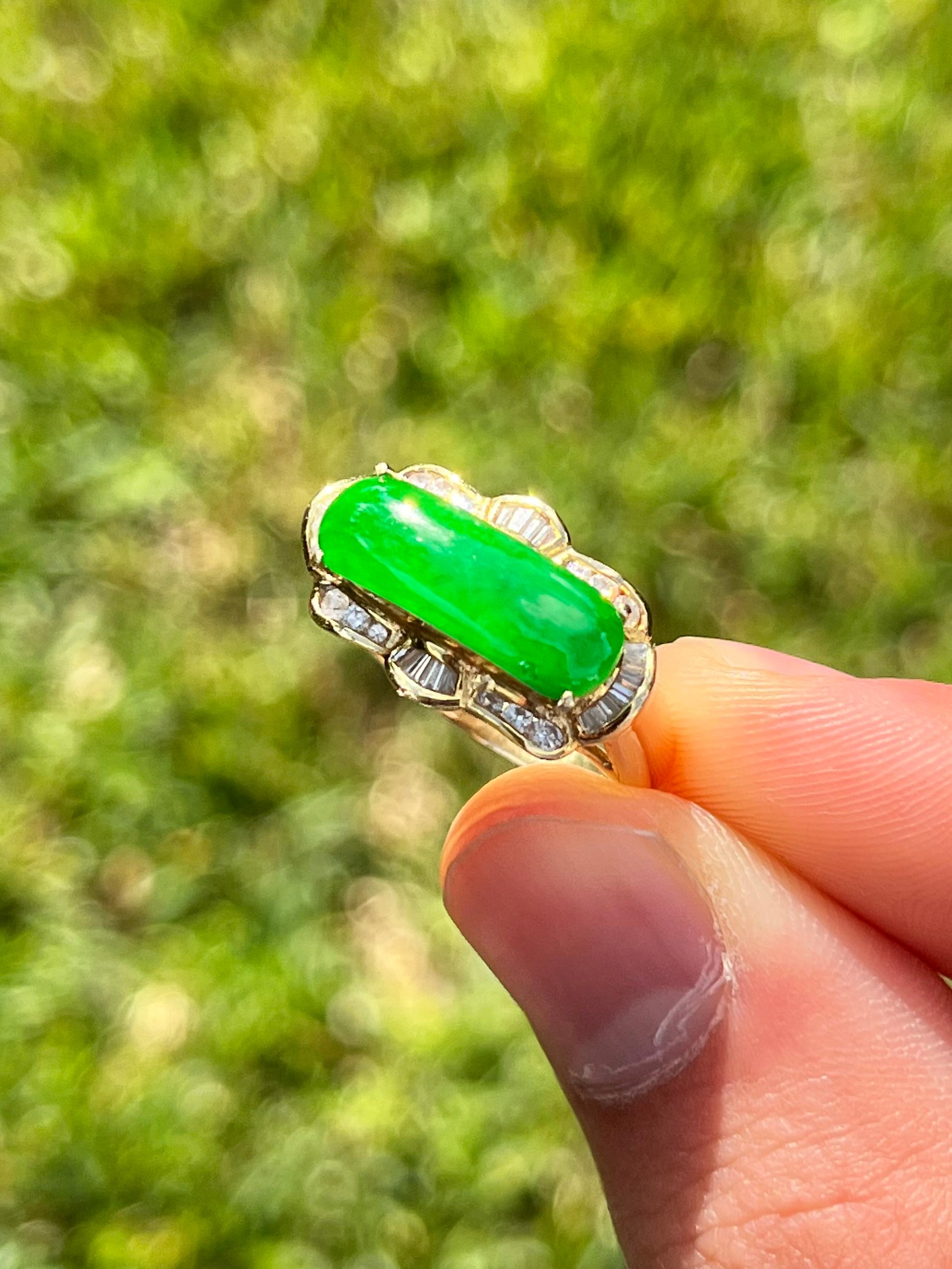 This ring centers a 4-carat Jadeite Jade with natural diamond side stones. This ring has a dainty and delicate flair design that gives the optics of an elongated Jade center stone.

This piece is super light and cute, versatile enough for both