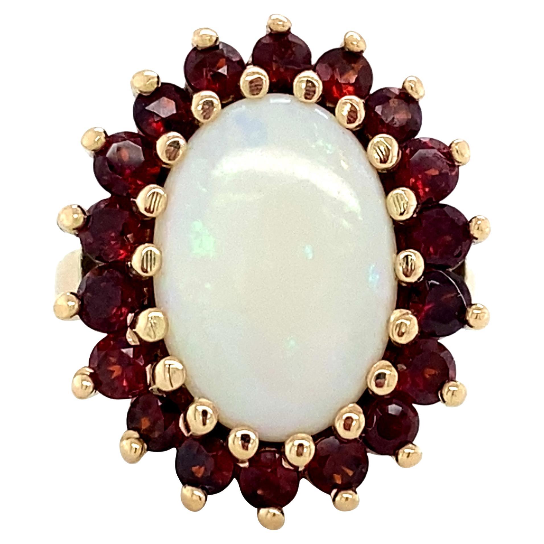 Anello cocktail d'epoca con opale naturale e granato, oro giallo 14K