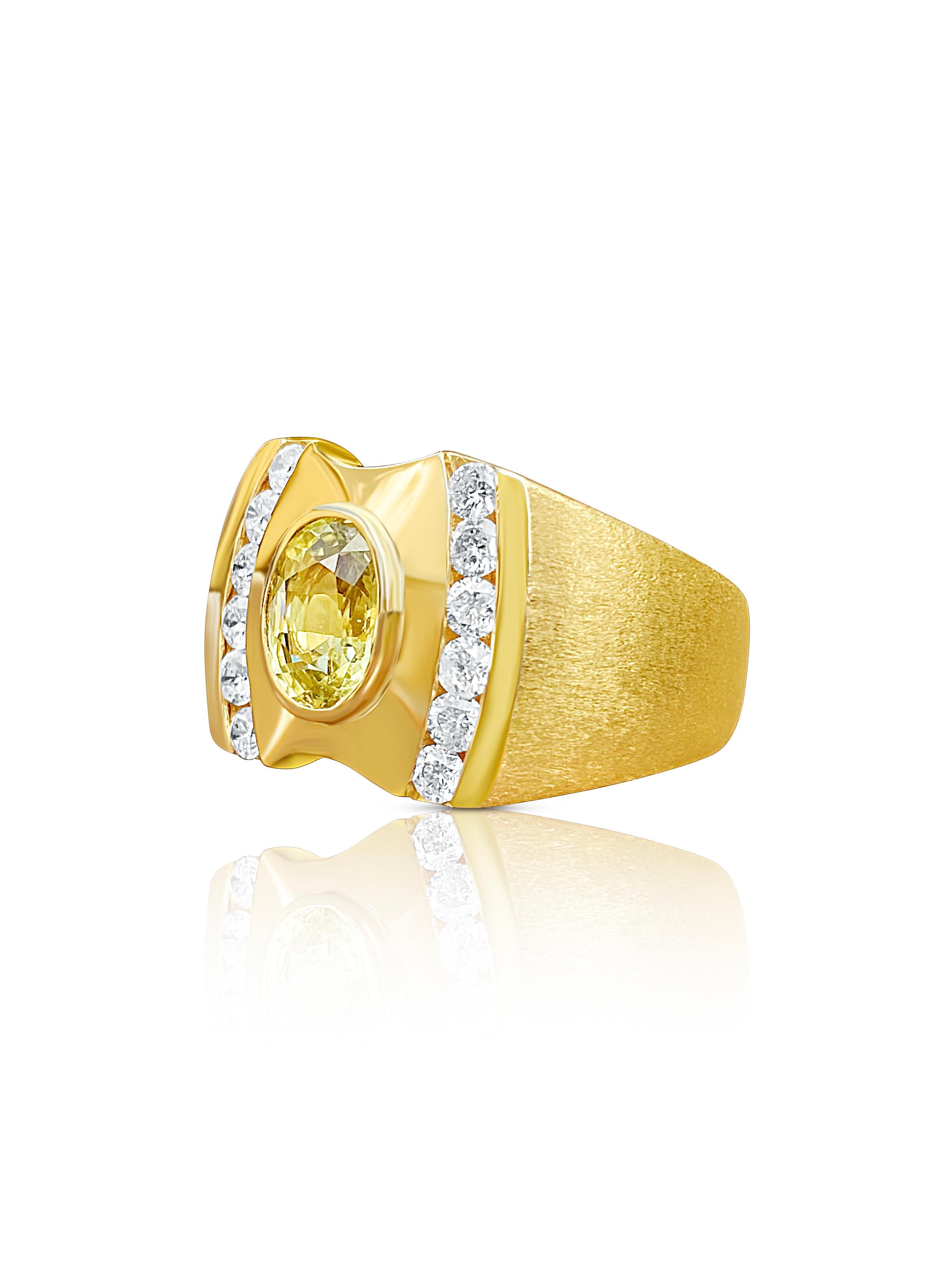 Centering a 2.55 Carat Oval-Cut Yellow Ceylon Sapphire, framed by 12 Round-Brilliant Cut Diamonds, and set in 14K Yellow Gold, this men's ring style is timeless for a reason– and the Yellow Sapphire vivid as possible!

Details: 
✔ Stone: Sapphire
✔
