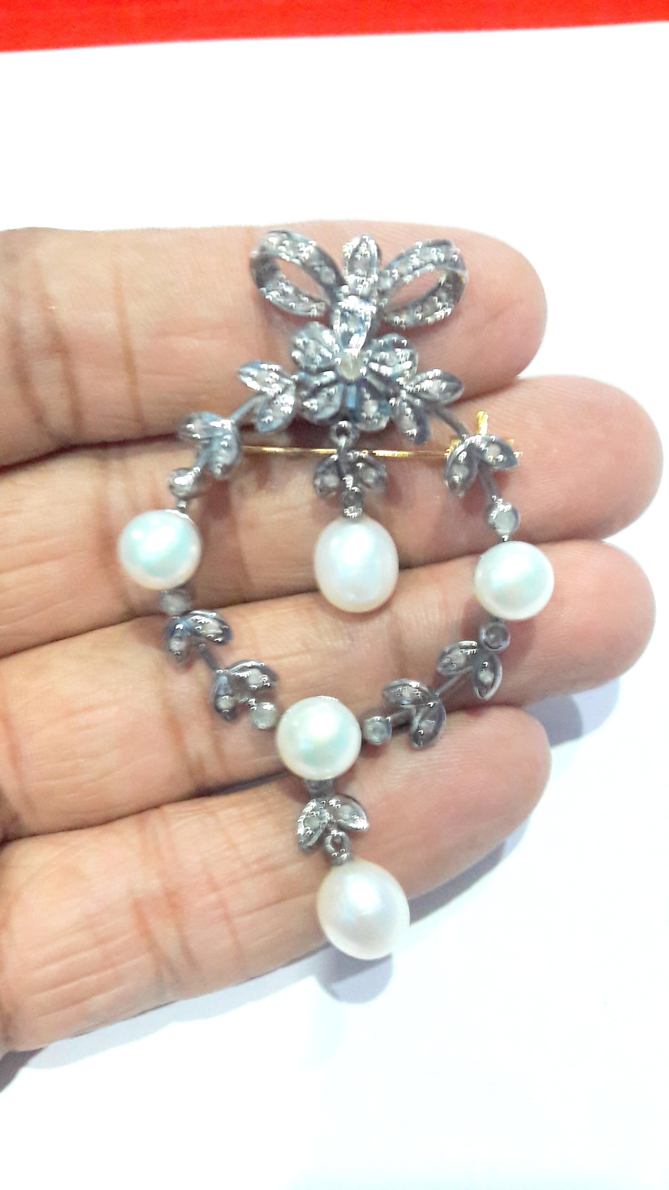 This is a beautiful sterling silver handmade diamond brooch. This brooch consists of :

Diamond weight- 2.40cts
Diamond type- Rose cut
Diamond origin- Natural/ mined
Metal- Sterling silver
Metal purity- 925 silver
Metal color- 18K Yellow gold