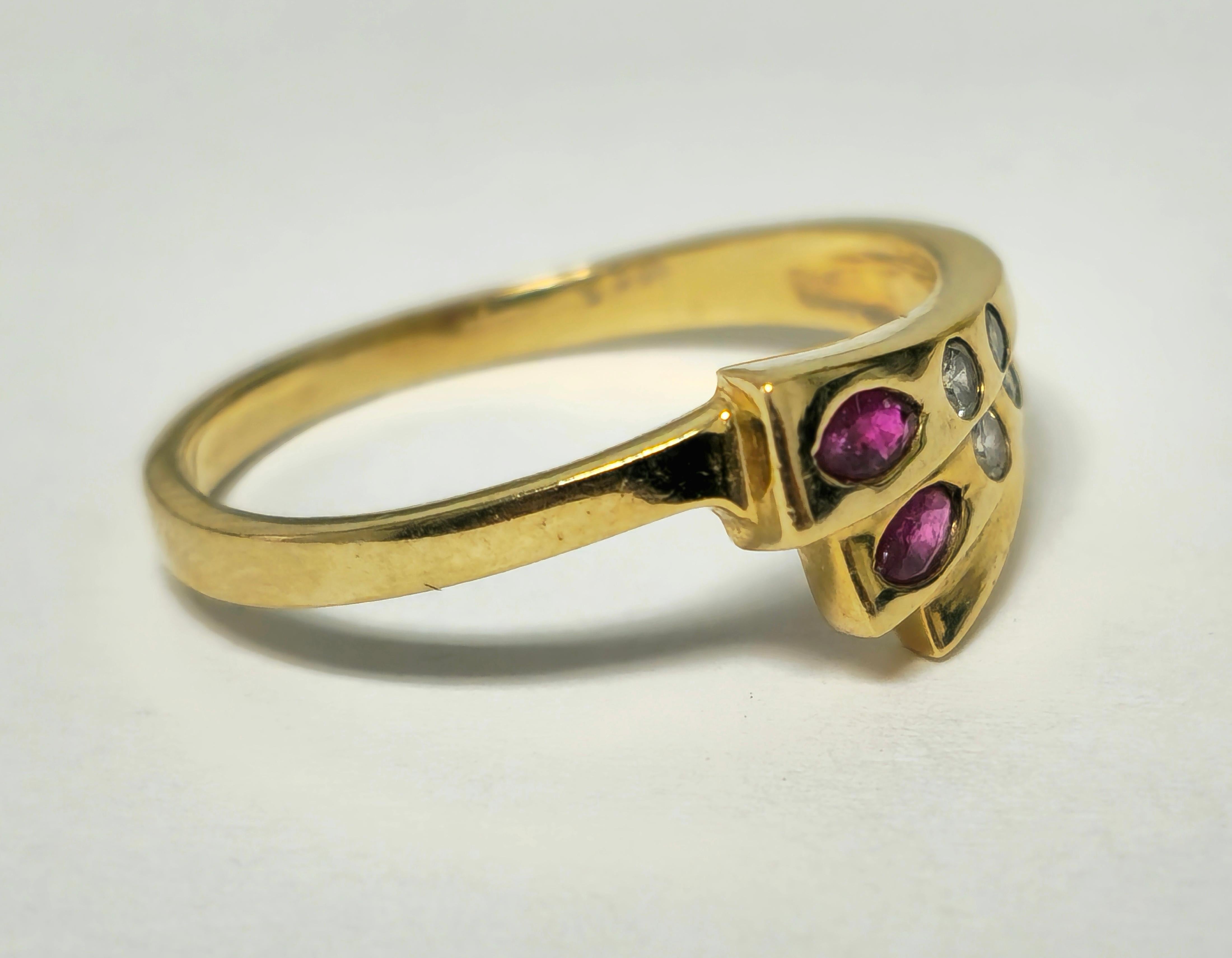 Elevate your style with this vintage diamond and ruby cocktail ring for women, crafted from 14k yellow gold and adorned with a stunning 0.14 carat marquise-shaped ruby, boasting excellent color and saturation. Accentuating the design are 0.18 carats