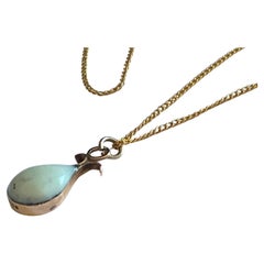 9ct Gold Mounted  Natural Stone Pendant with trapped flower
