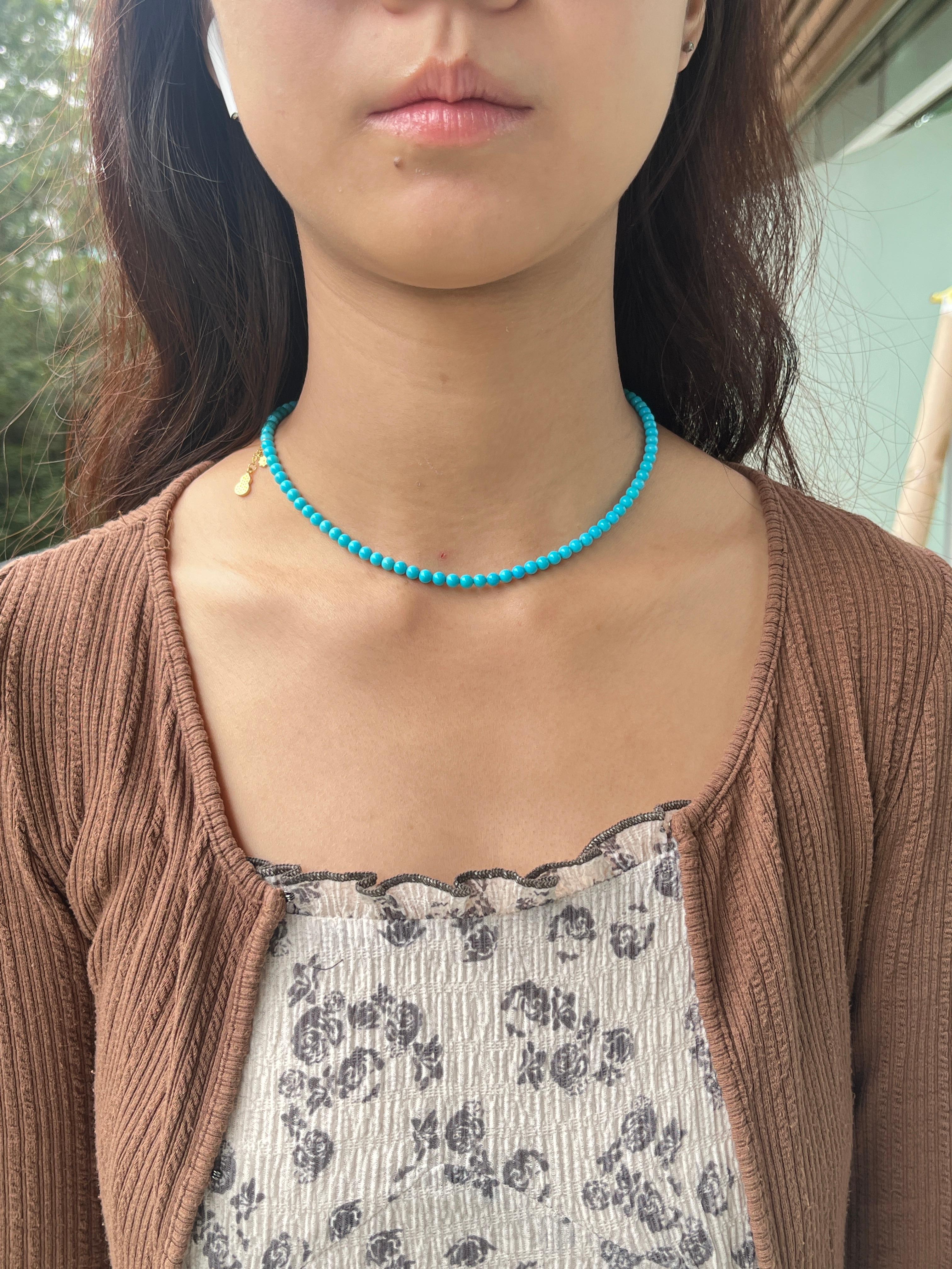 Contemporary Vintage 4.5mm Natural Turquoise Bead Necklace with Gold Plated Clasp For Sale