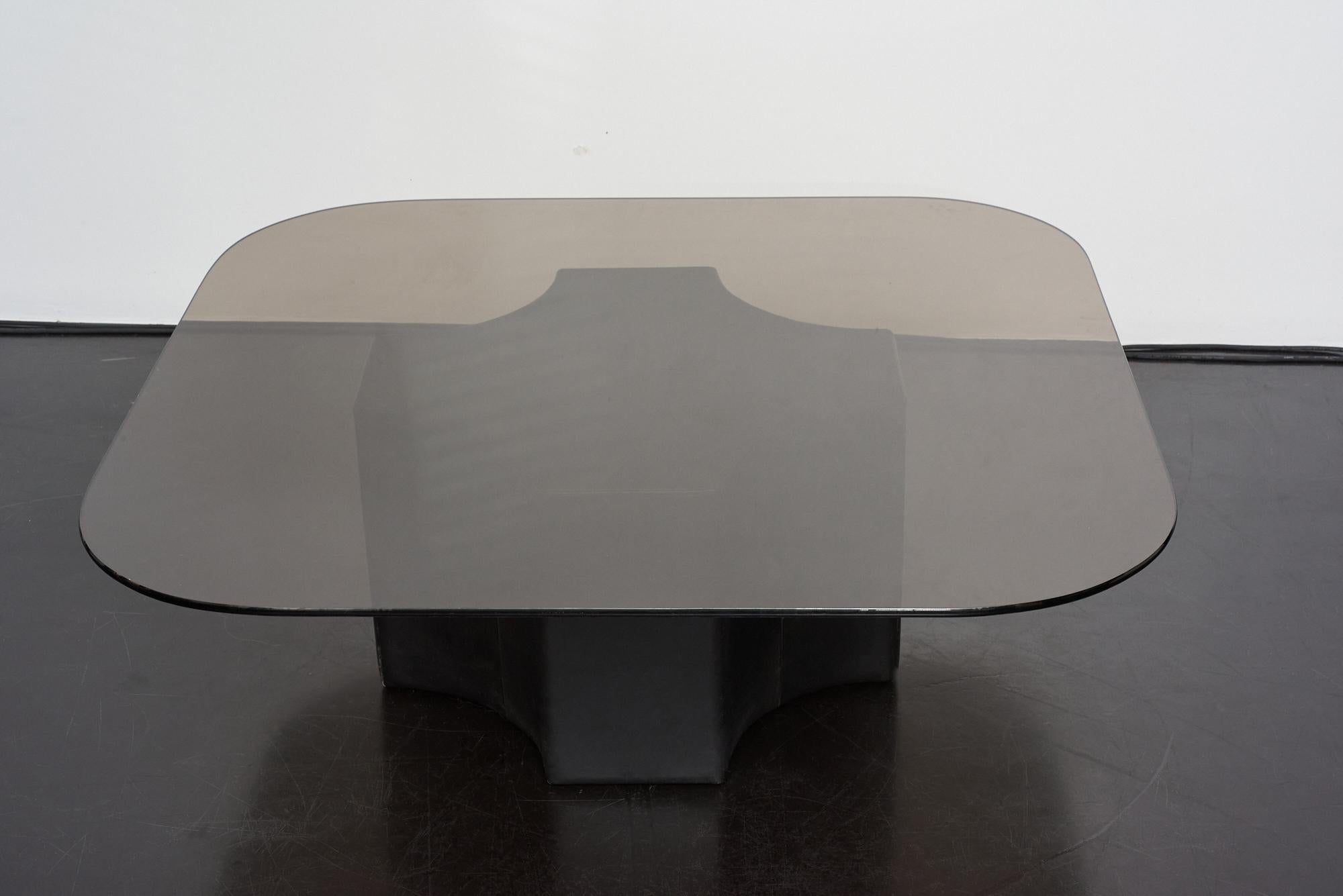 Beautiful and elegant leather coffee table with round edged smoked glass top
Excellent condition.