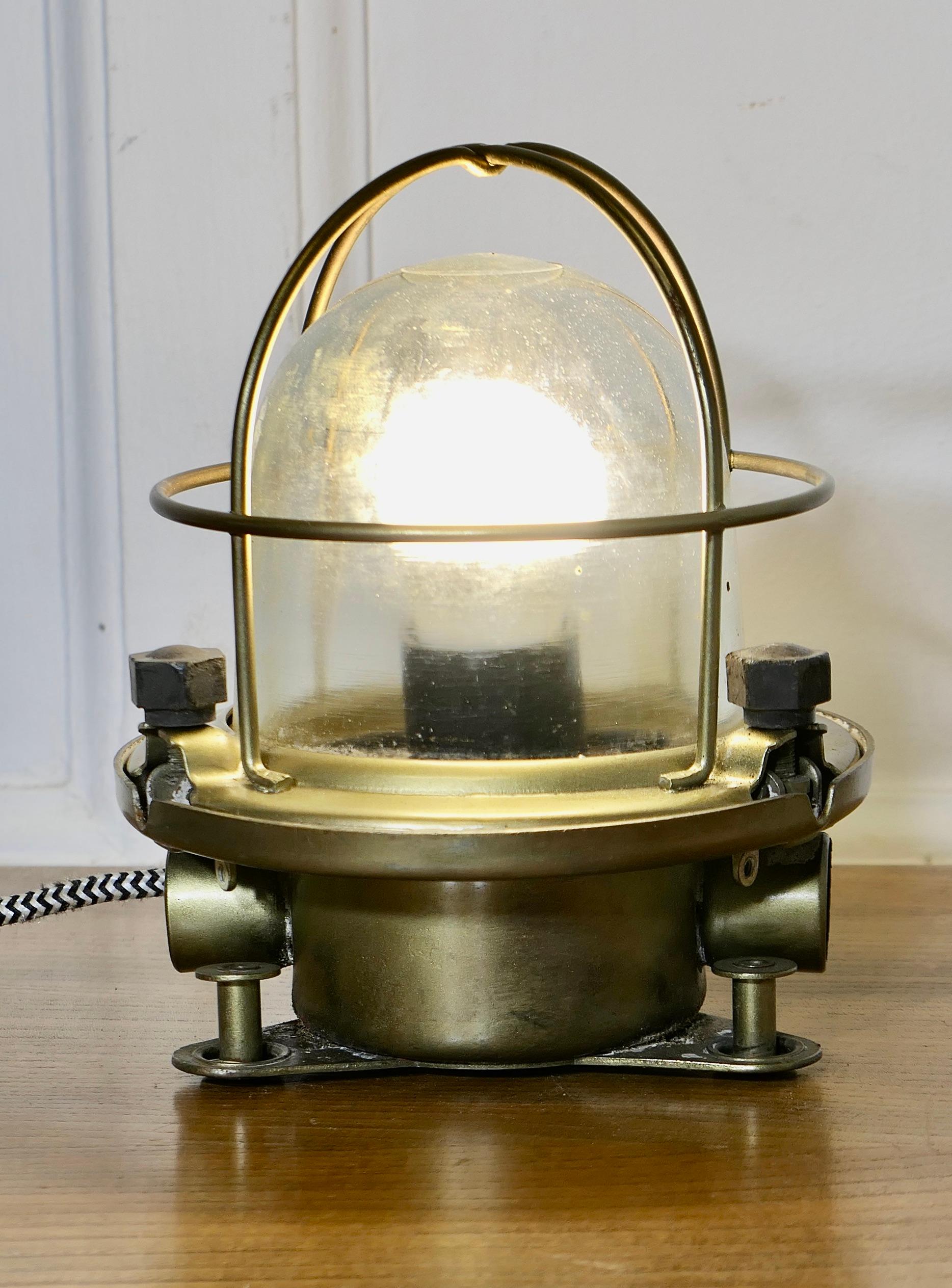 Vintage Nautical Brass Bulk Head Light  

The Lamp is made in brass it has been fully restored and rewired, it can be used on a table or fixed to a wall
The Lamp is in very good condition, rewired and restored just to mention there are flaws in the