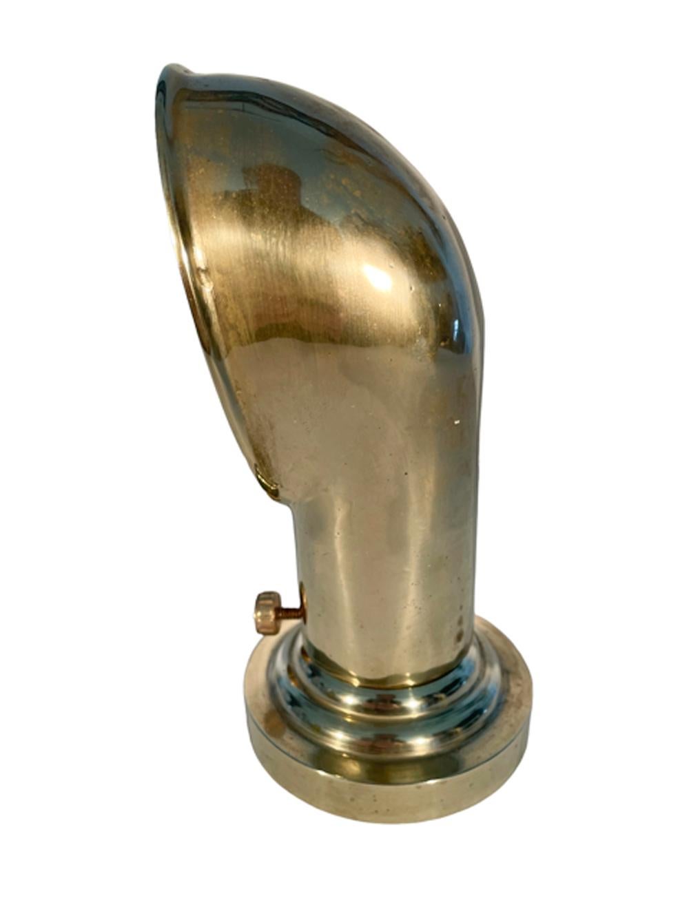 Midcentury nautical style, sand-cast brass ashtray with a single cigar / cigarette rest in the form of a ships cowl vent, the stepped base can be removed for emptying and cleaning.