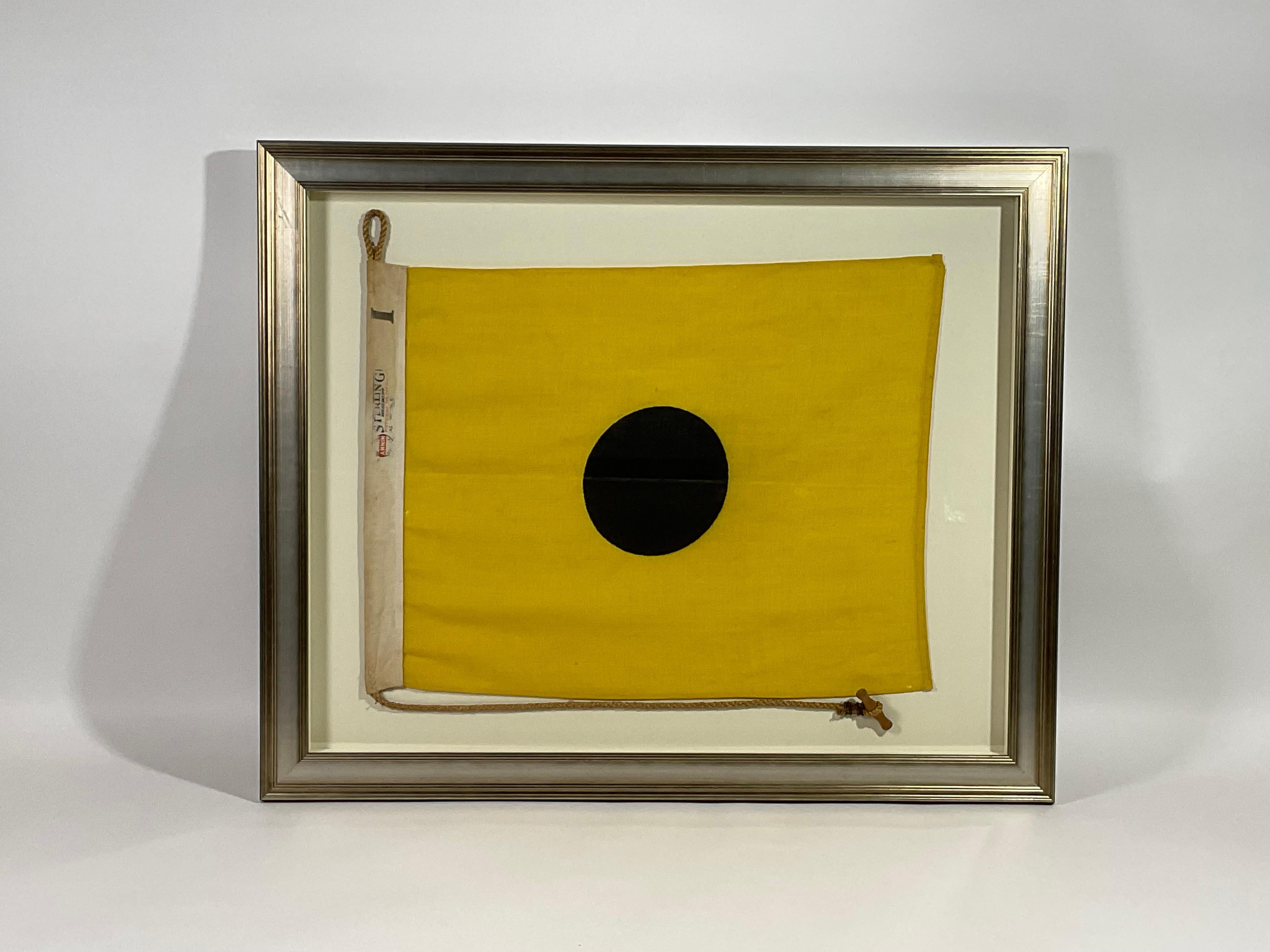 yellow flag black dot
