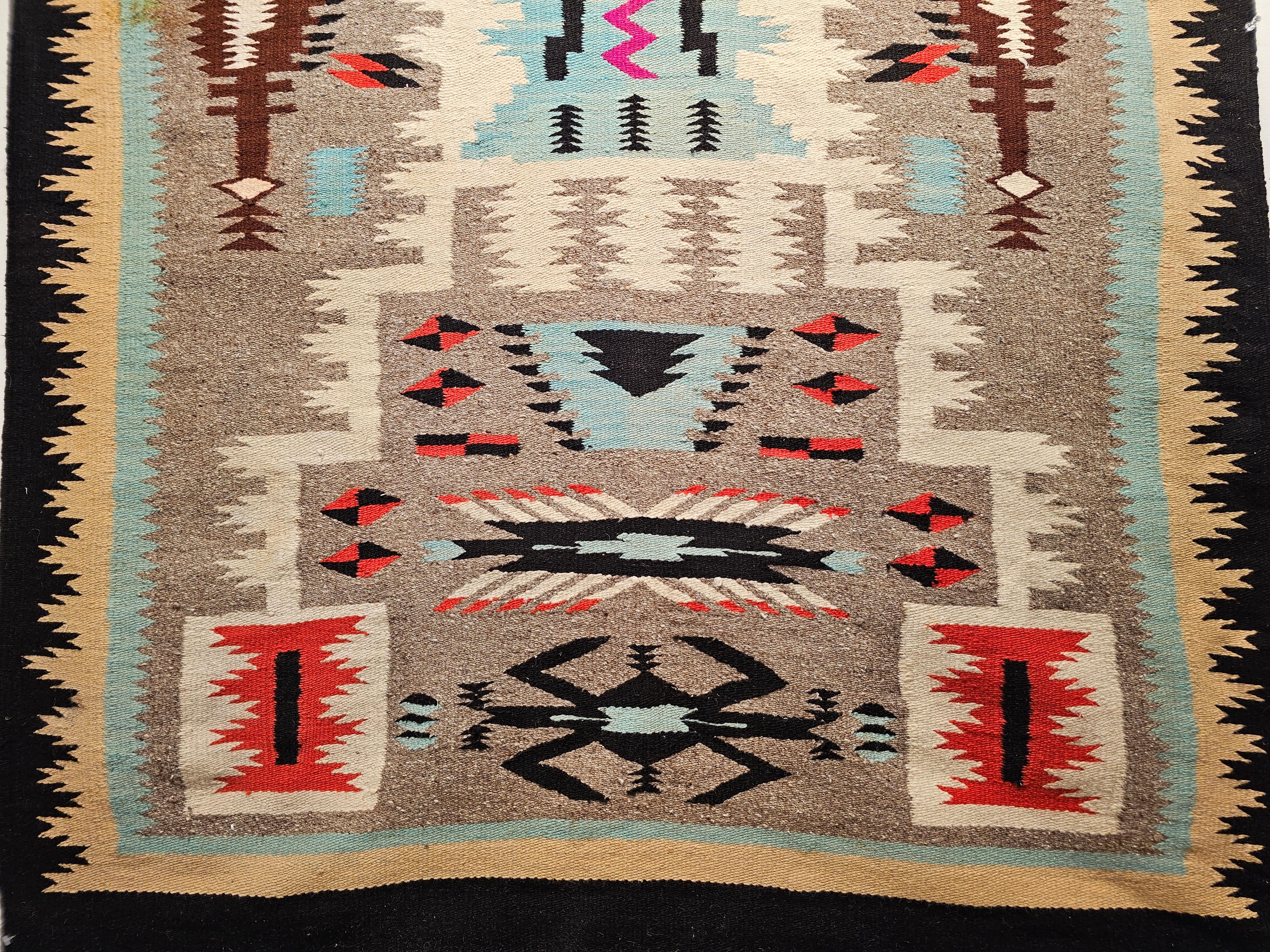 Vintage American Navajo Rug in Storm Warrior Design in turquoise, Pink, Magenta For Sale 1