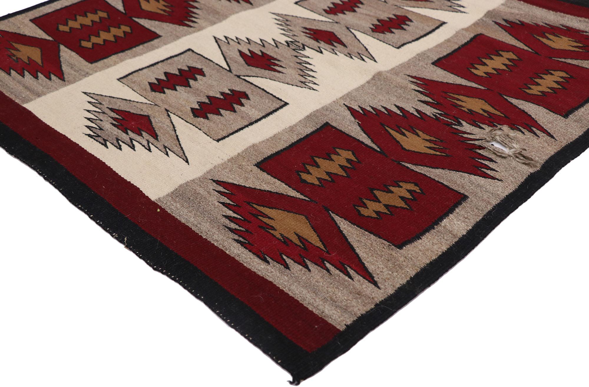 78134 Vintage Navajo Blanket rug, 03'03 x 03'03. With its incredible detail and texture, this handwoven vintage Navajo rug is a captivating vision of woven beauty. The striking tribal pattern and earthy colorway woven into this Navajo rug work