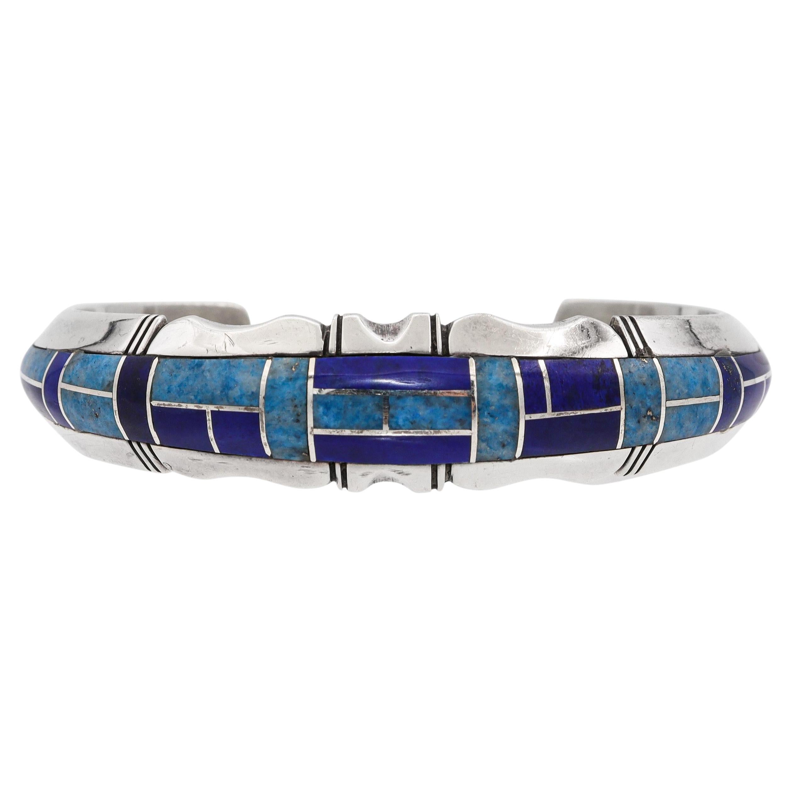 Bracciale d'epoca Navajo Gilbert Nelson in argento sterling con intarsio di più pietre