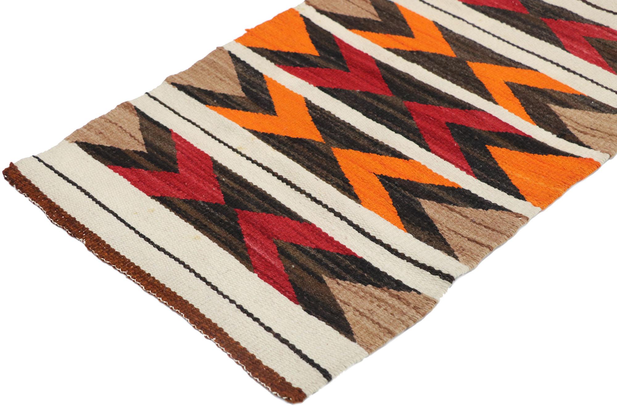 77779, vintage Navajo Kilim rug with Two Grey Hills style. With its bold expressive design, incredible detail and texture, this hand-woven wool vintage Navajo Kilim rug is a captivating vision of woven beauty highlighting Native American style with