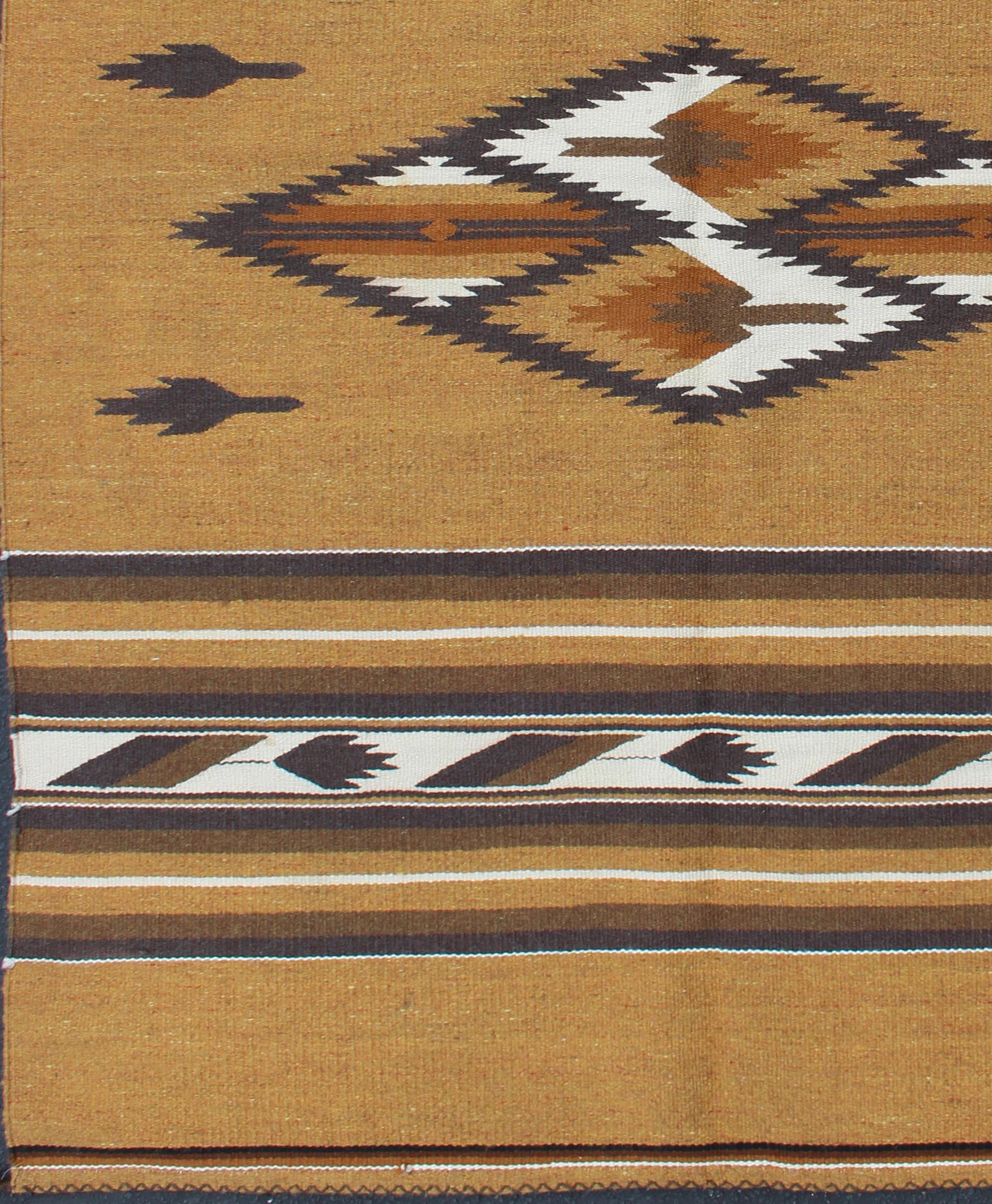 American Vintage Navajo Kilim with Tribal Design in Earthy Tones For Sale