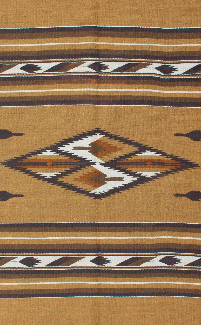 Hand-Woven Vintage Navajo Kilim with Tribal Design in Earthy Tones For Sale
