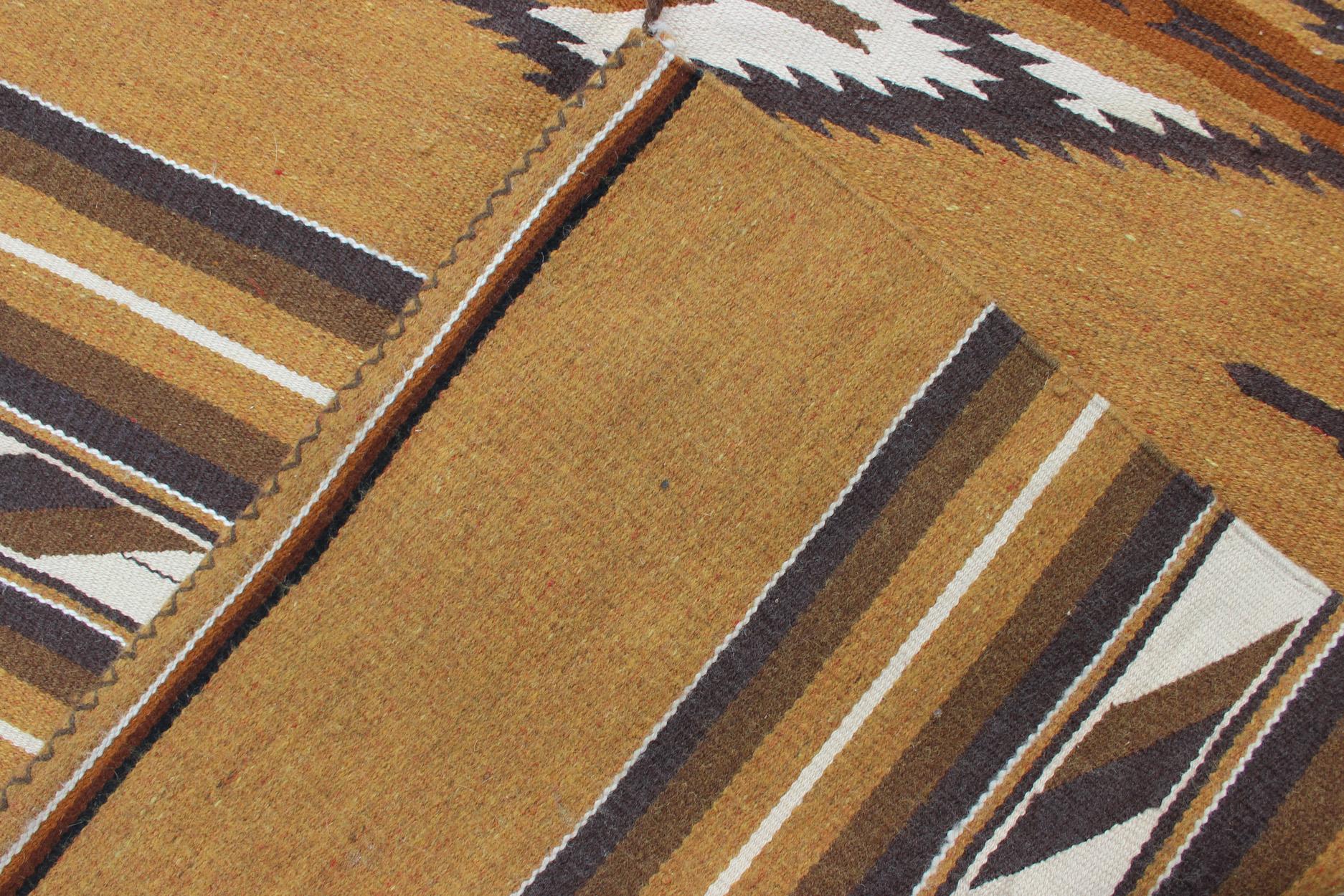 Vintage Navajo Kilim with Tribal Design in Earthy Tones In Good Condition For Sale In Atlanta, GA