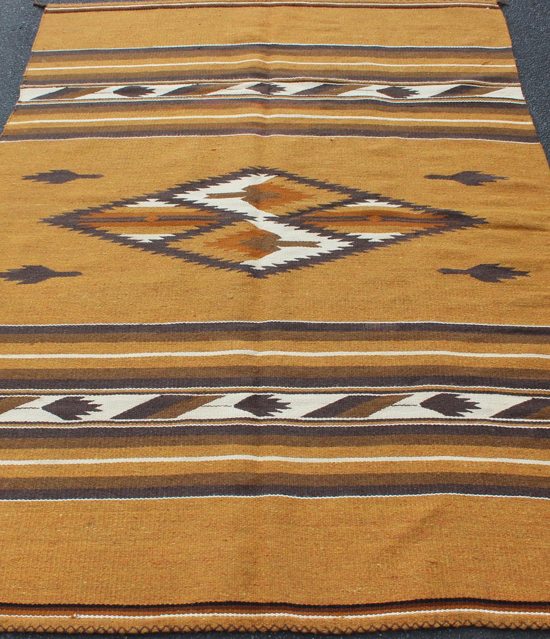 20th Century Vintage Navajo Kilim with Tribal Design in Earthy Tones For Sale