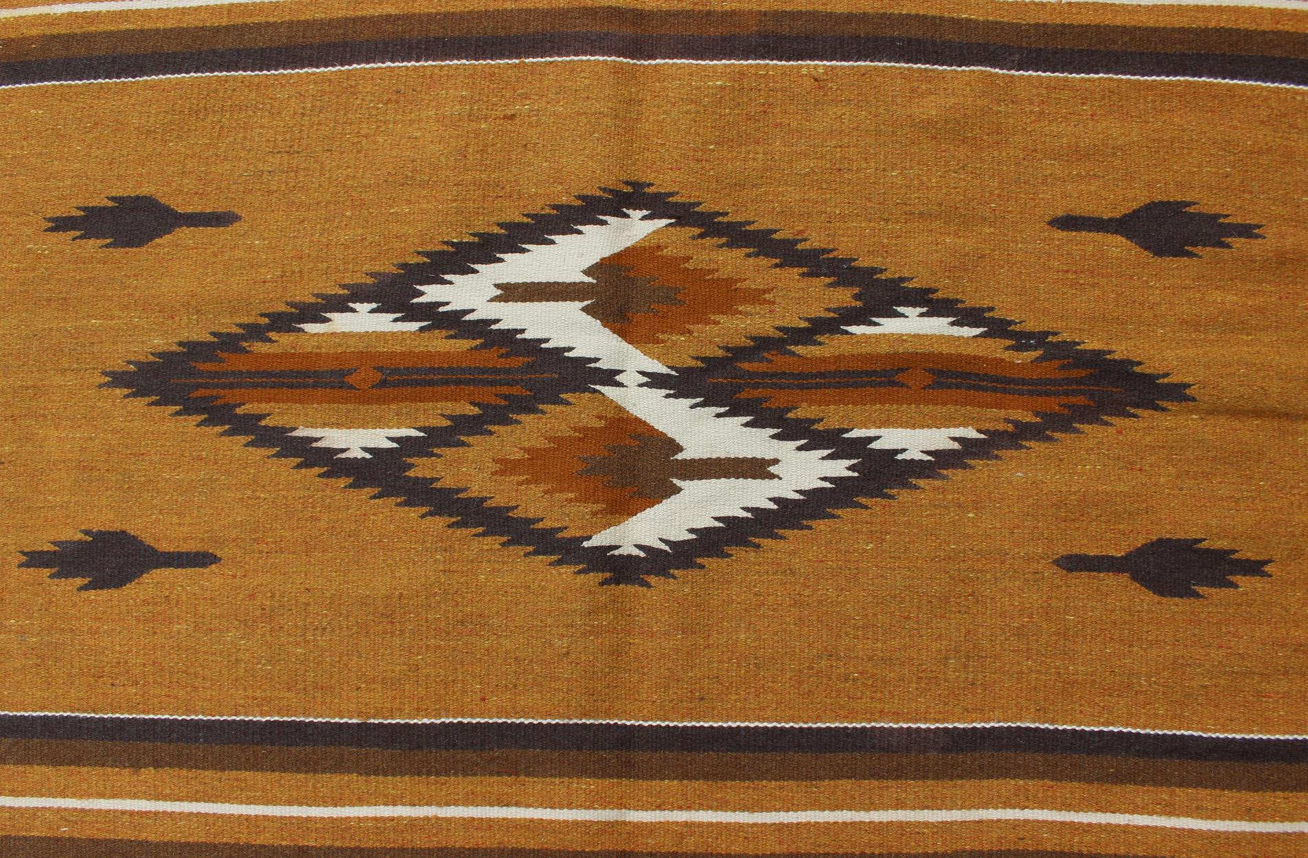 Vintage Navajo Kilim with Tribal Design in Earthy Tones For Sale 1