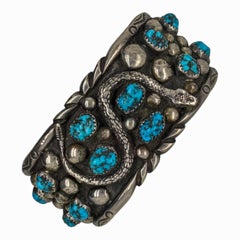 Pulsera tipo brazalete vintage navajo de plata de ley y turquesa con diseño de serpiente, firmada «JJ»