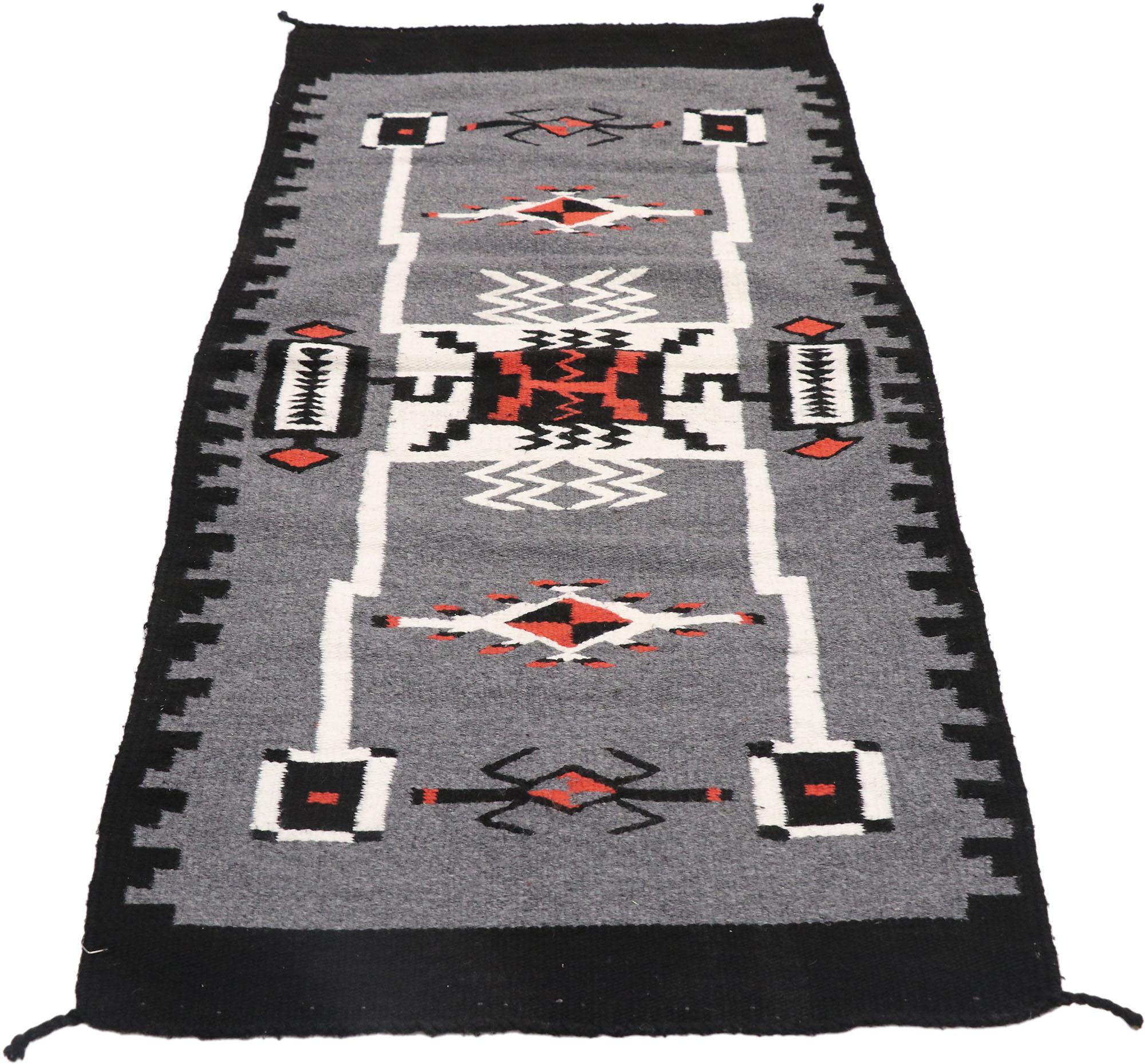 77959 Vintage Navajo Storm Pattern Kilim rug with Two Grey Hills Style 02'05 x 04'11. With its bold expressive design, incredible detail and texture, this hand-woven wool vintage Navajo Storm Pattern Kilim rug is a captivating vision of woven beauty